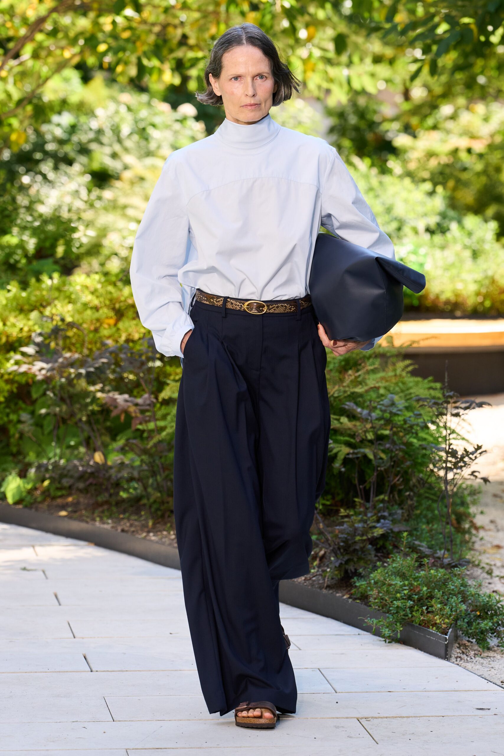 white relaxed shirt black pants