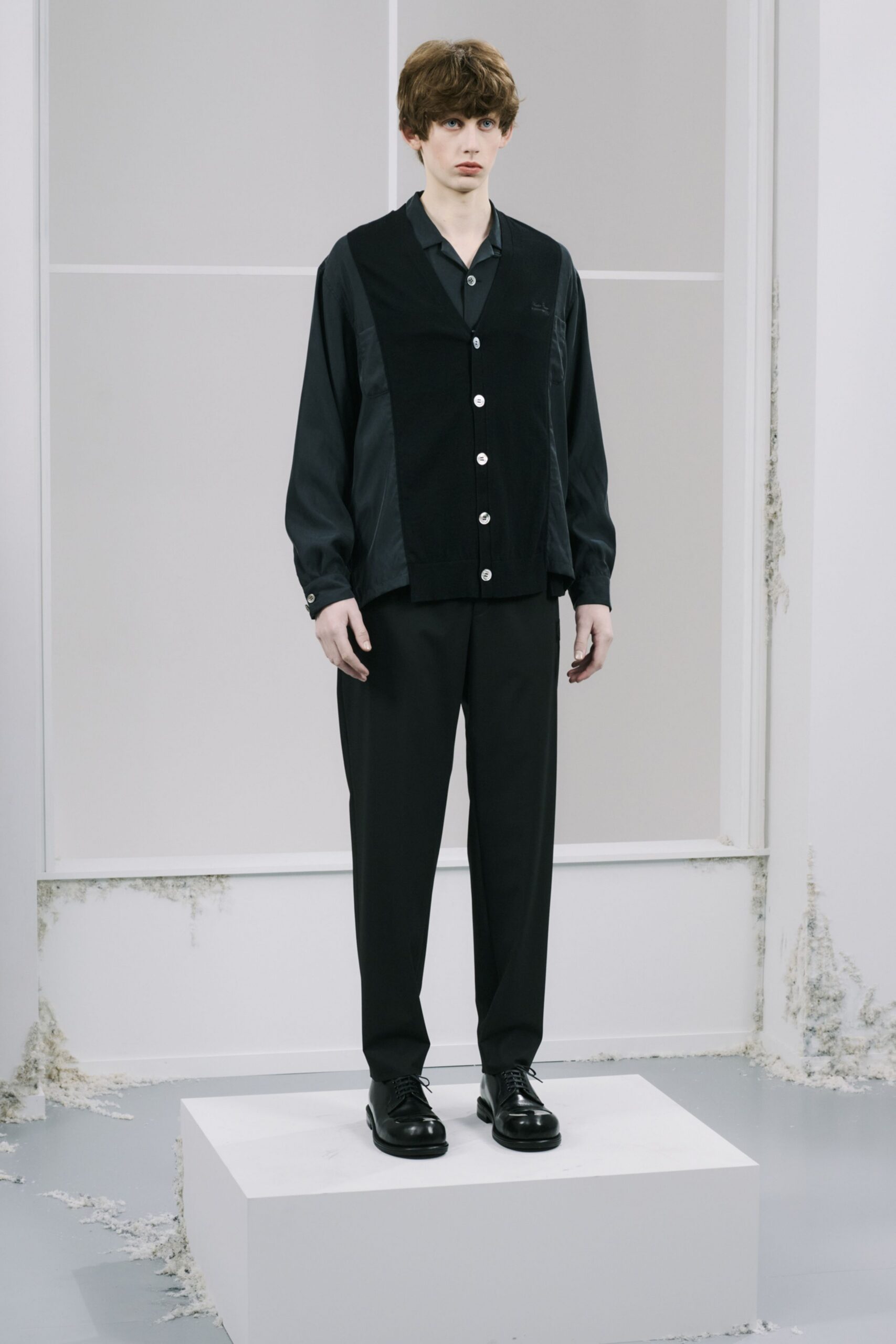 black shirt and vest outfit