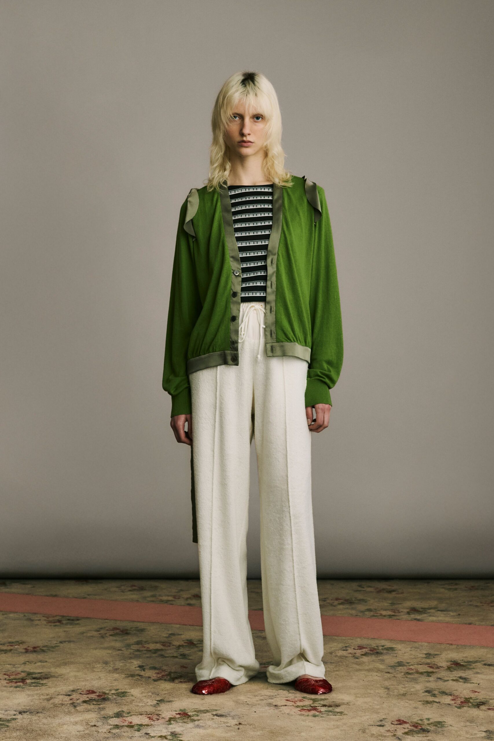 green cardigan with striped top
