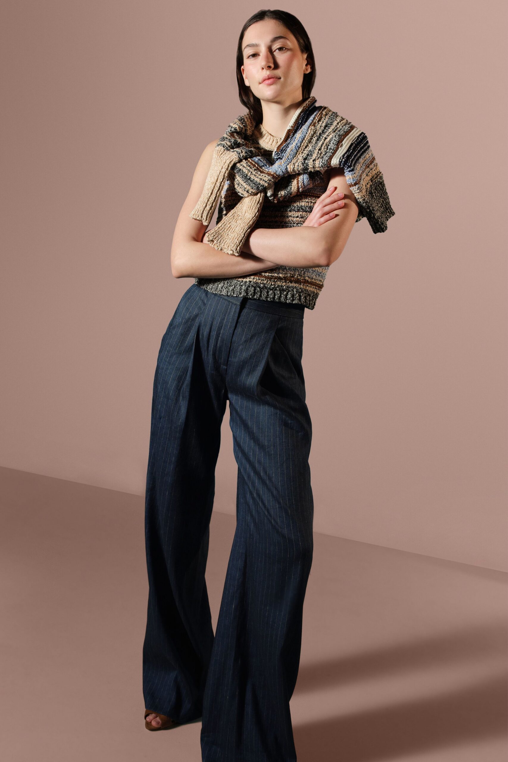 beige layered top with wide-leg pants