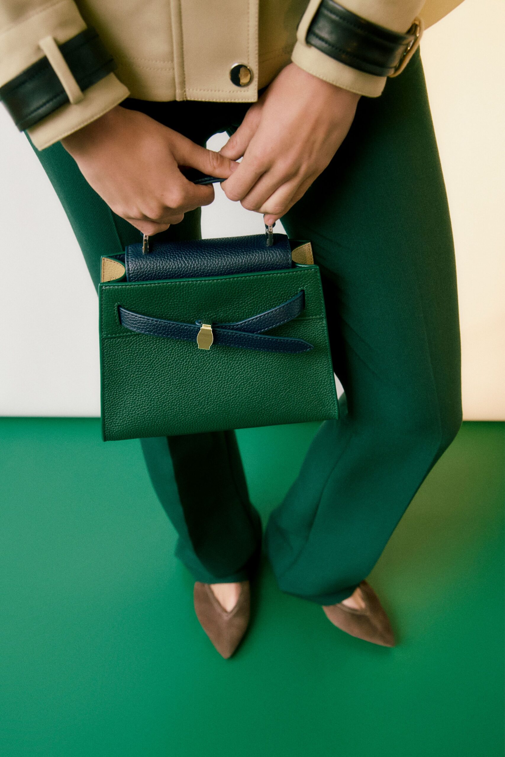 green tailored pants brown shoes