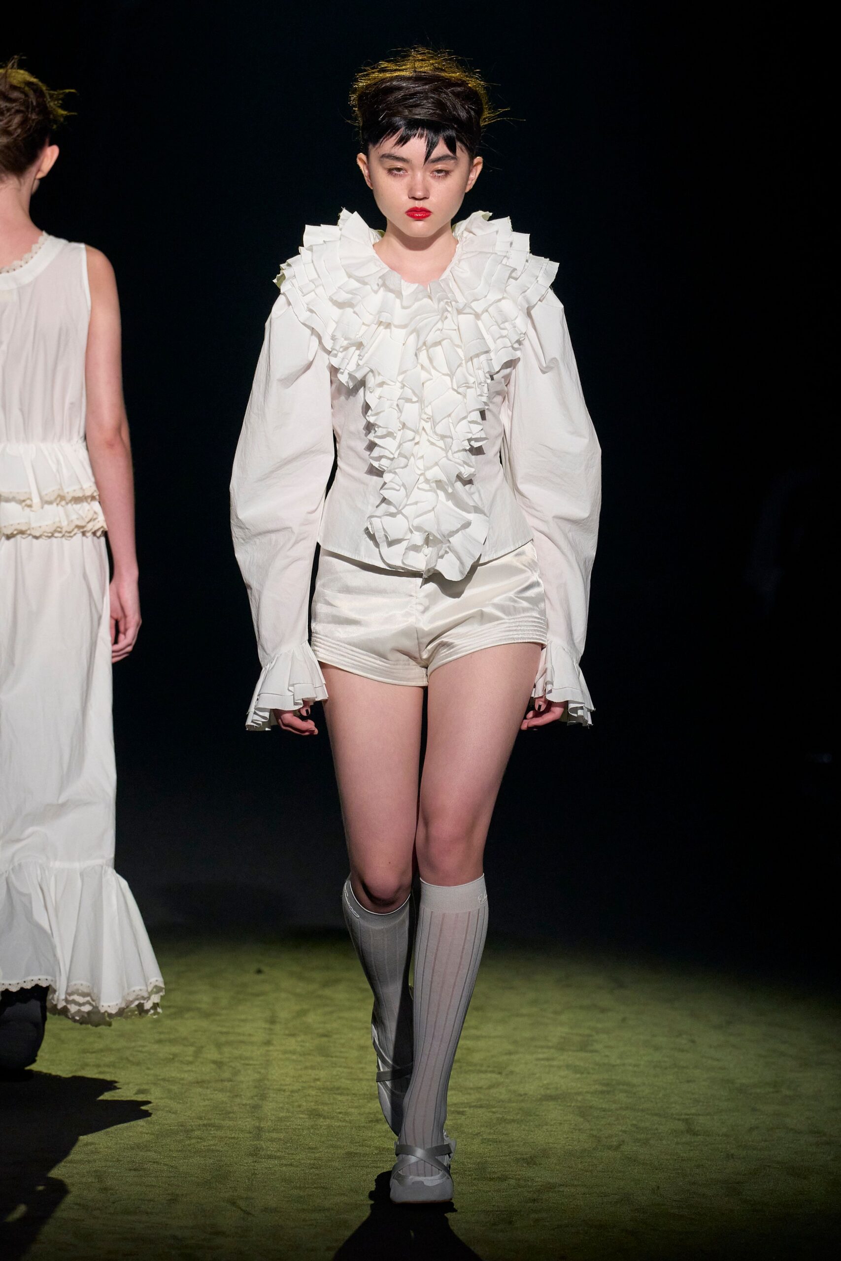 white ruffled blouse with shorts