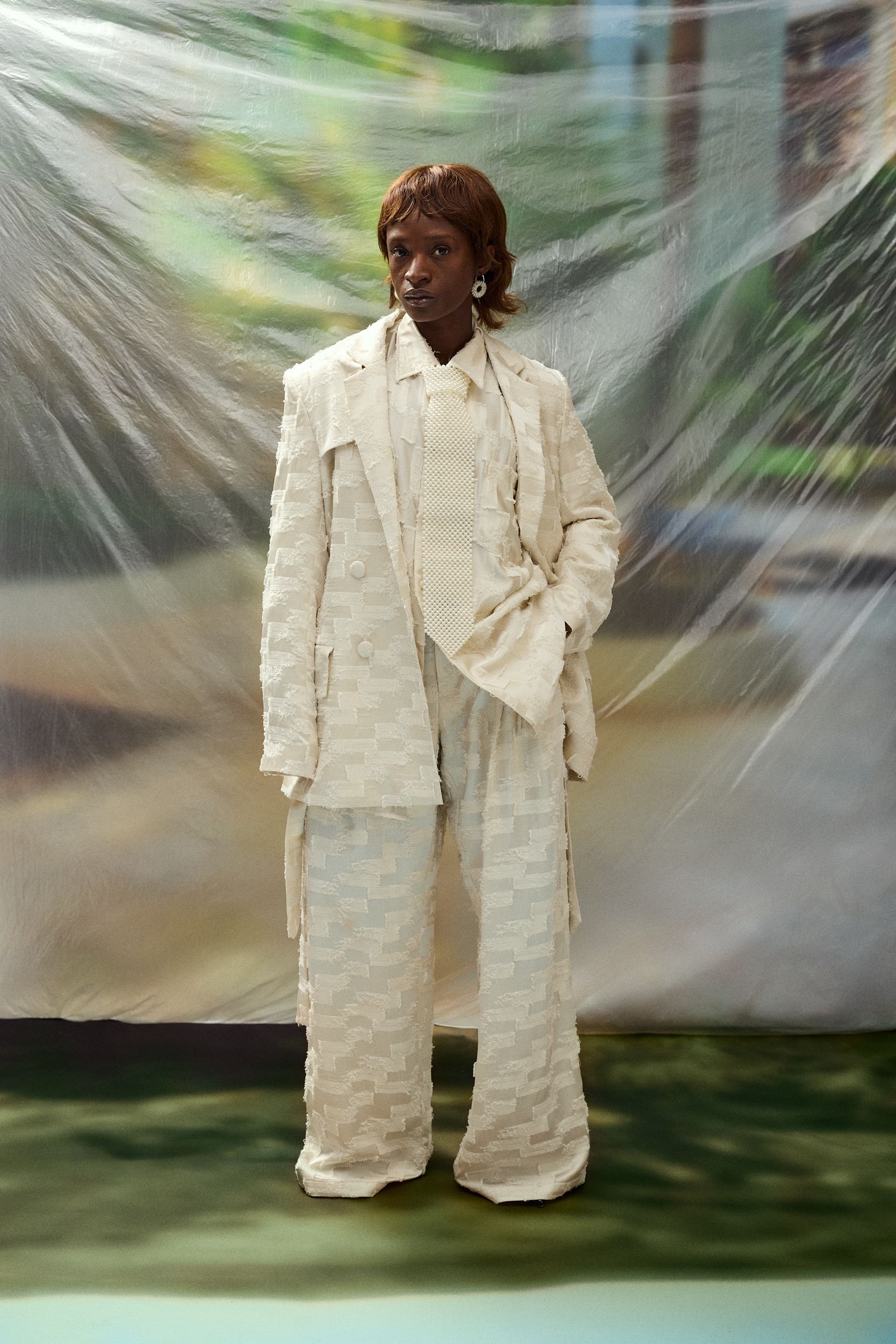 white relaxed suit with wide-leg pants