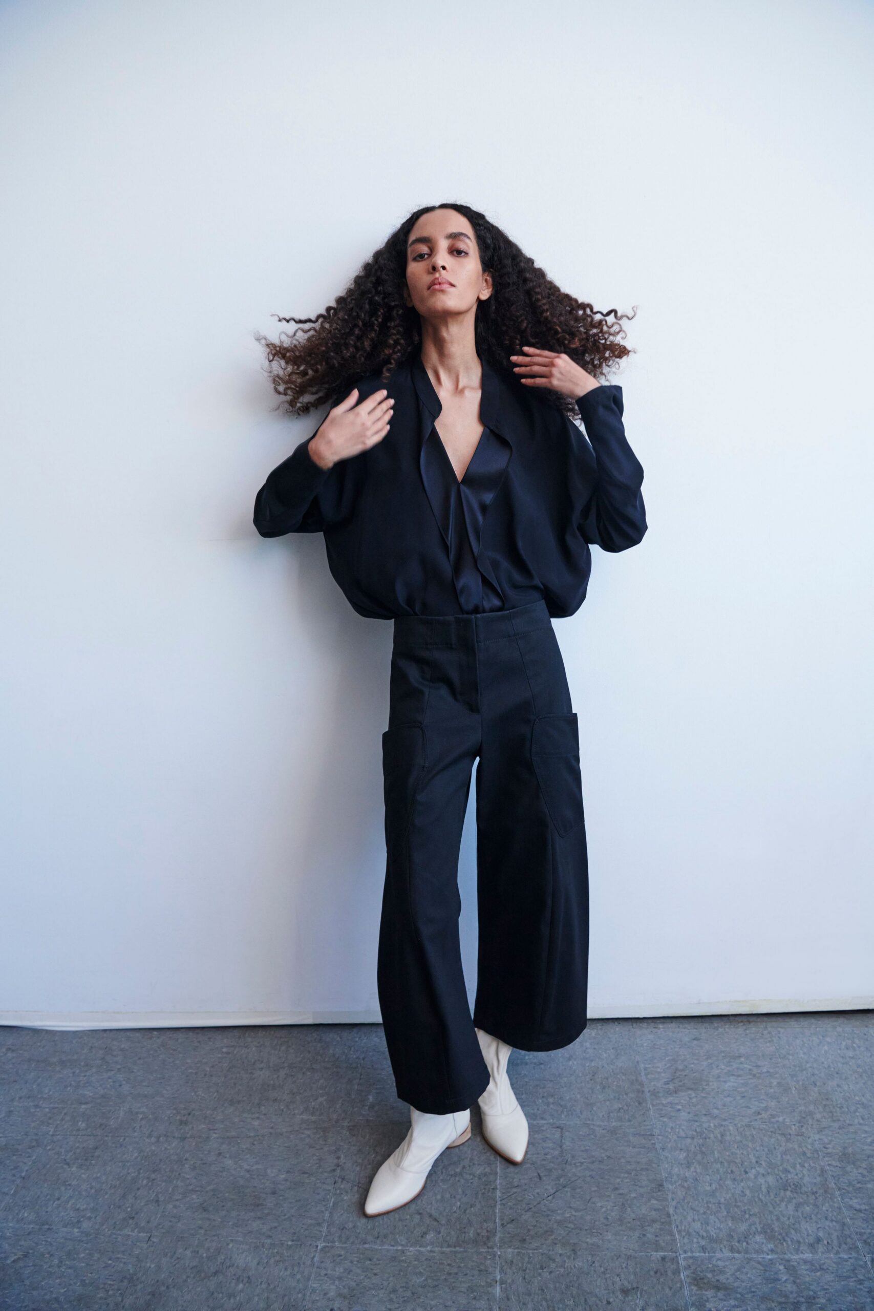black oversized blouse with cargo pants