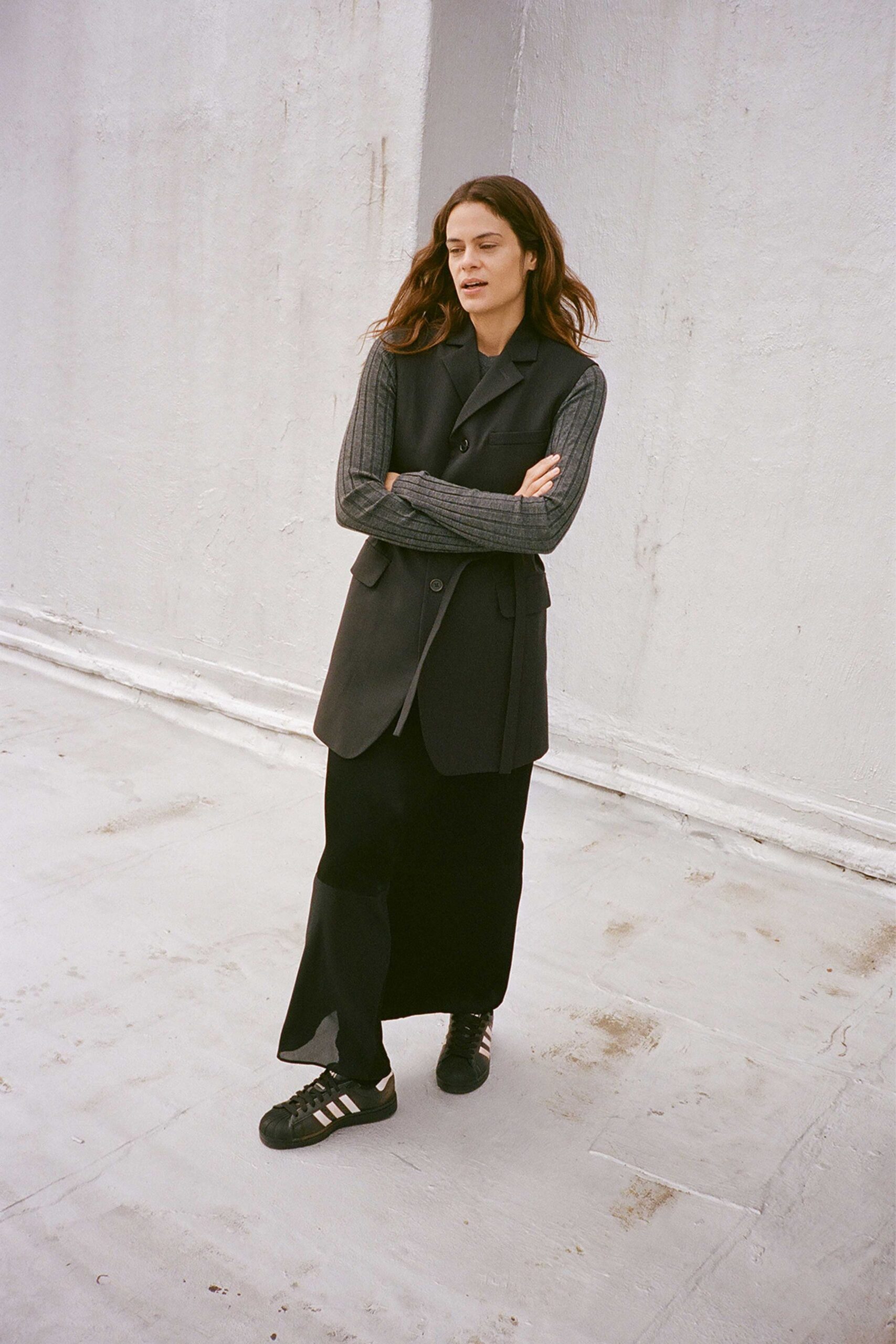 black fitted vest and midi dress