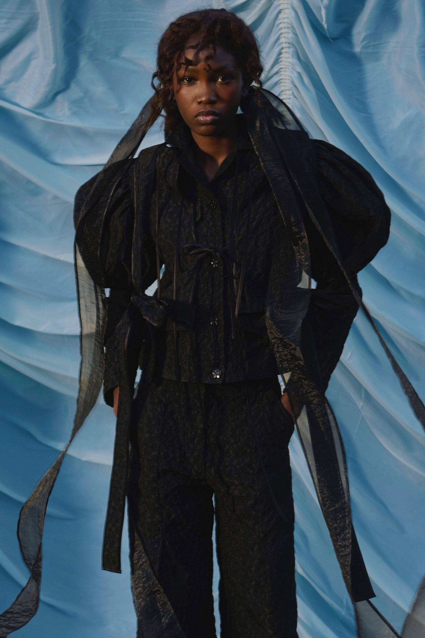 black fitted jacket and pants
