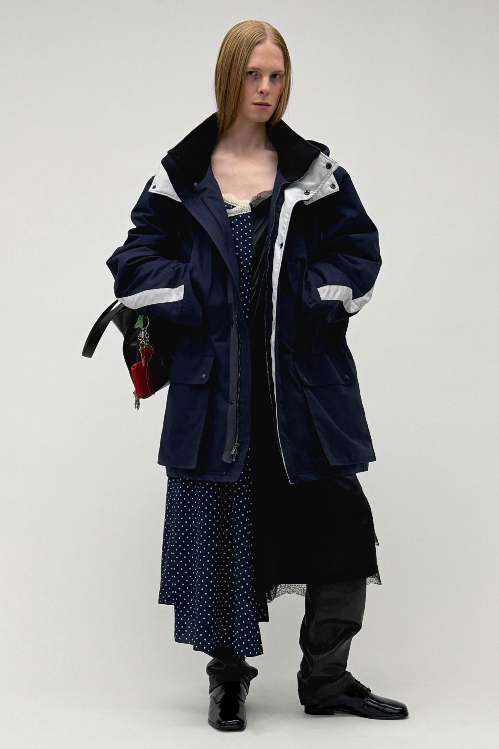 navy coat with black dress