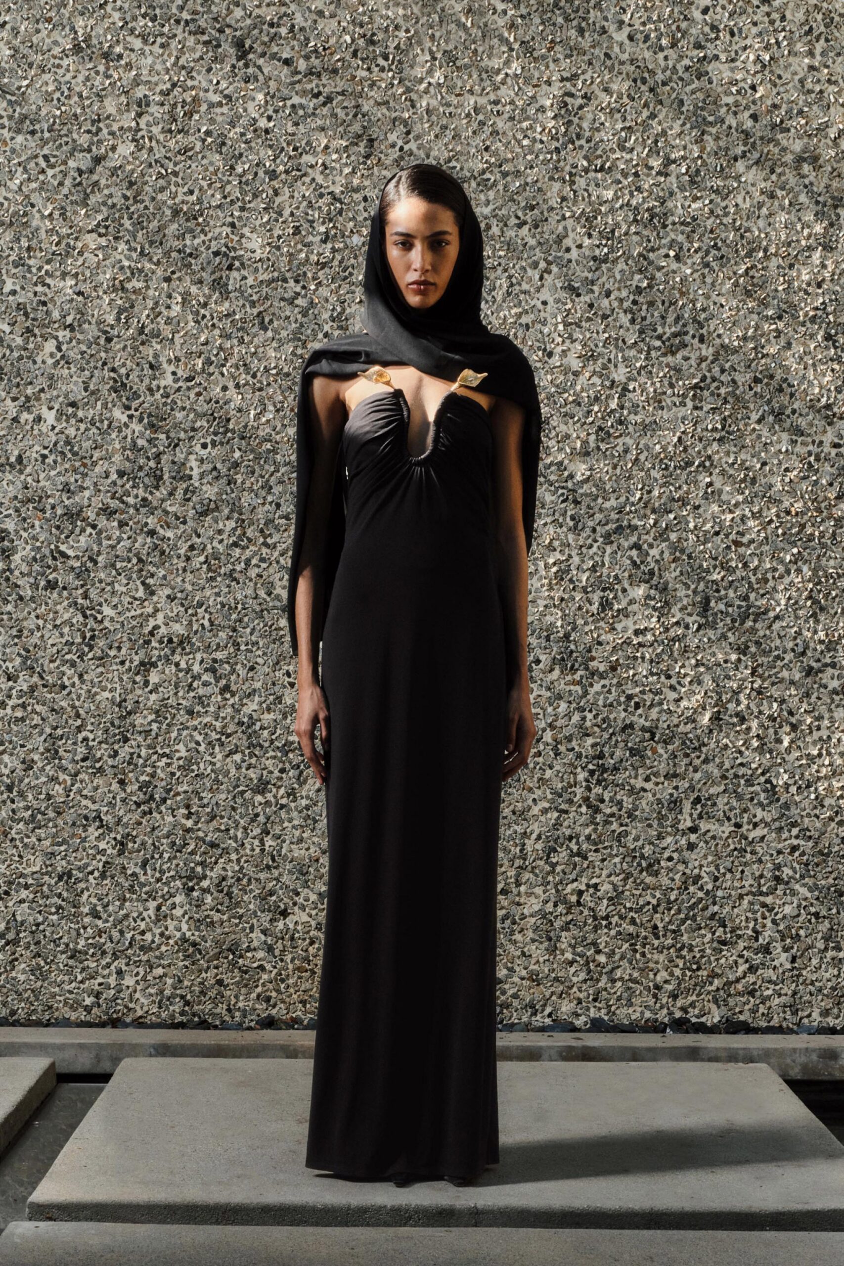 black silk fitted gown with cape