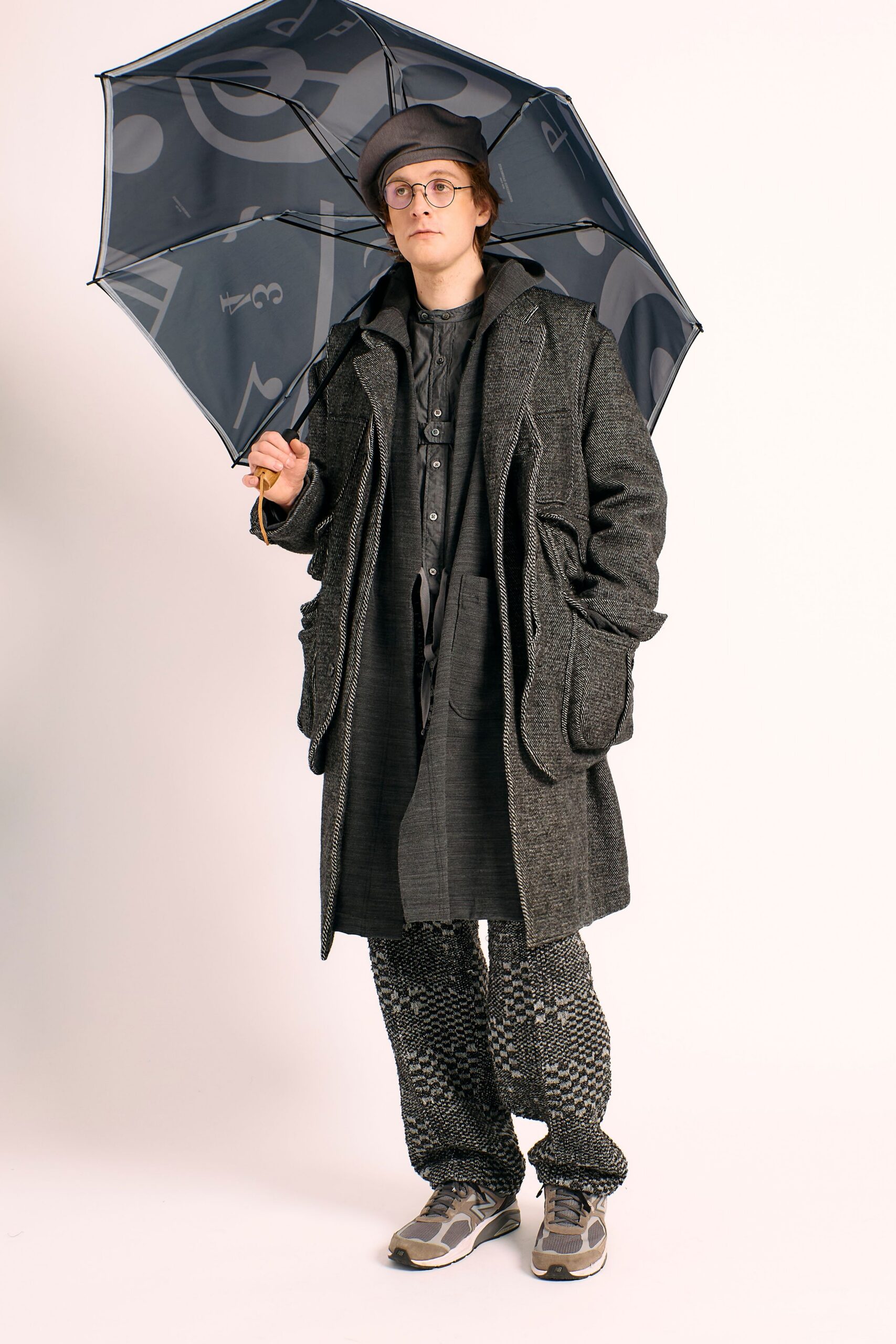 gray wool coat with umbrella