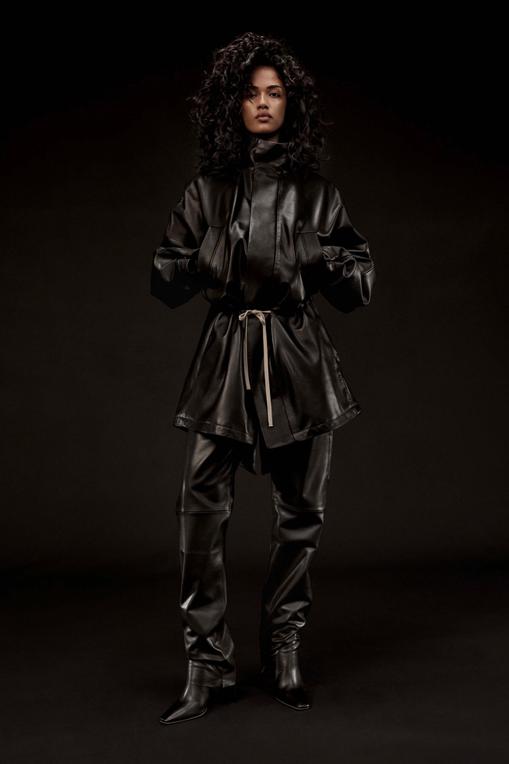 black leather long-sleeve collared relaxed belted jacket