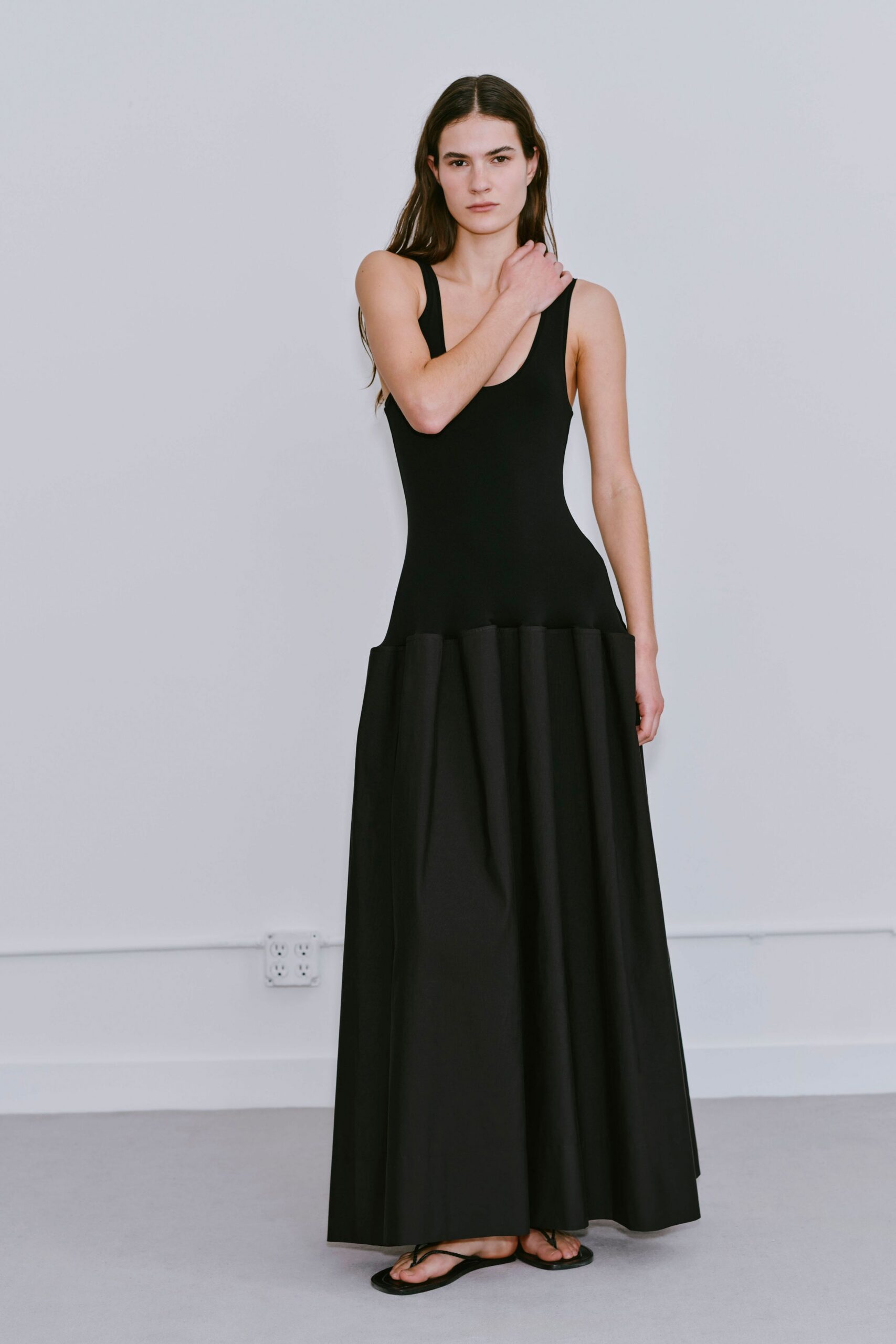black sleeveless maxi dress with pleats