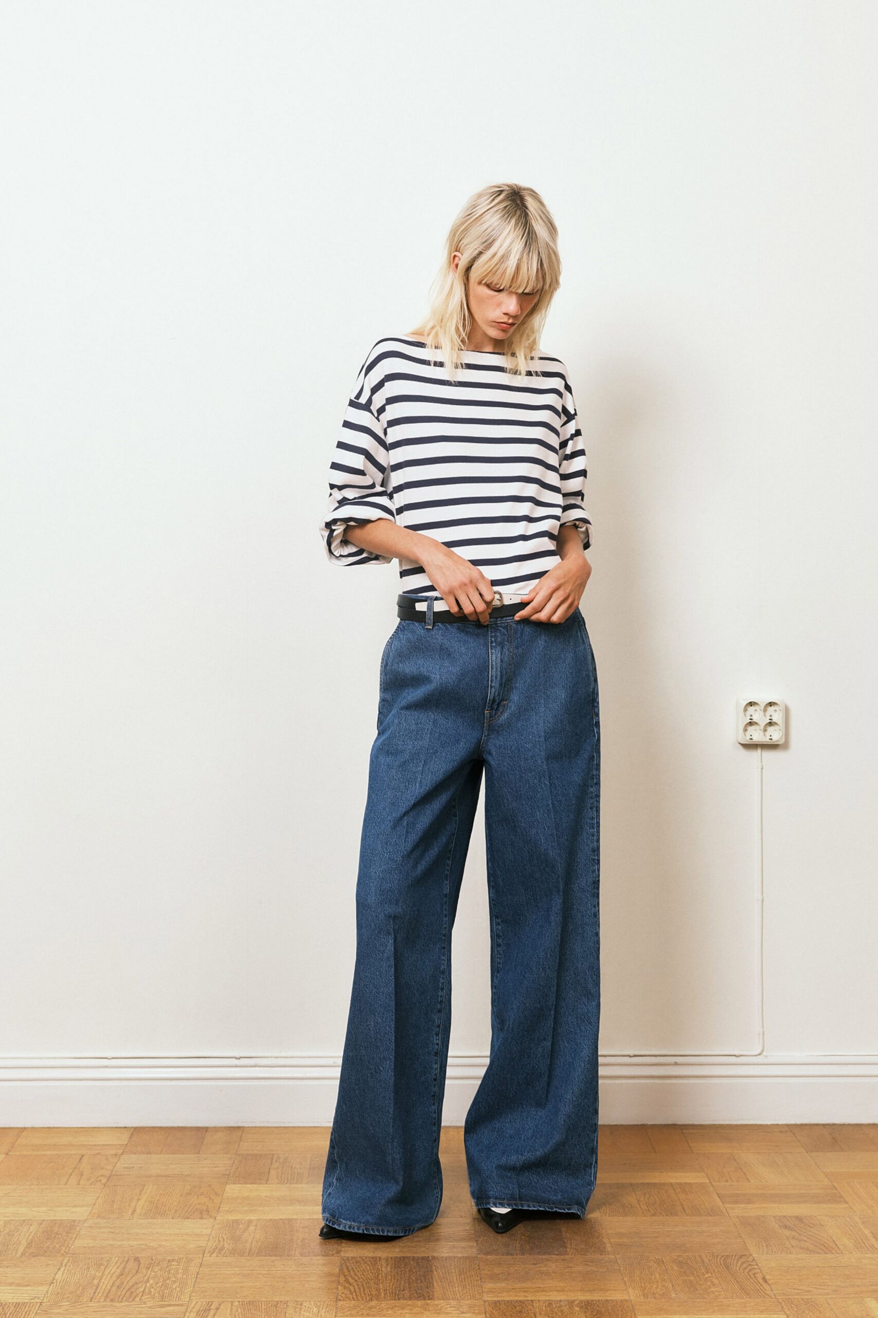 striped shirt with wide-leg jeans