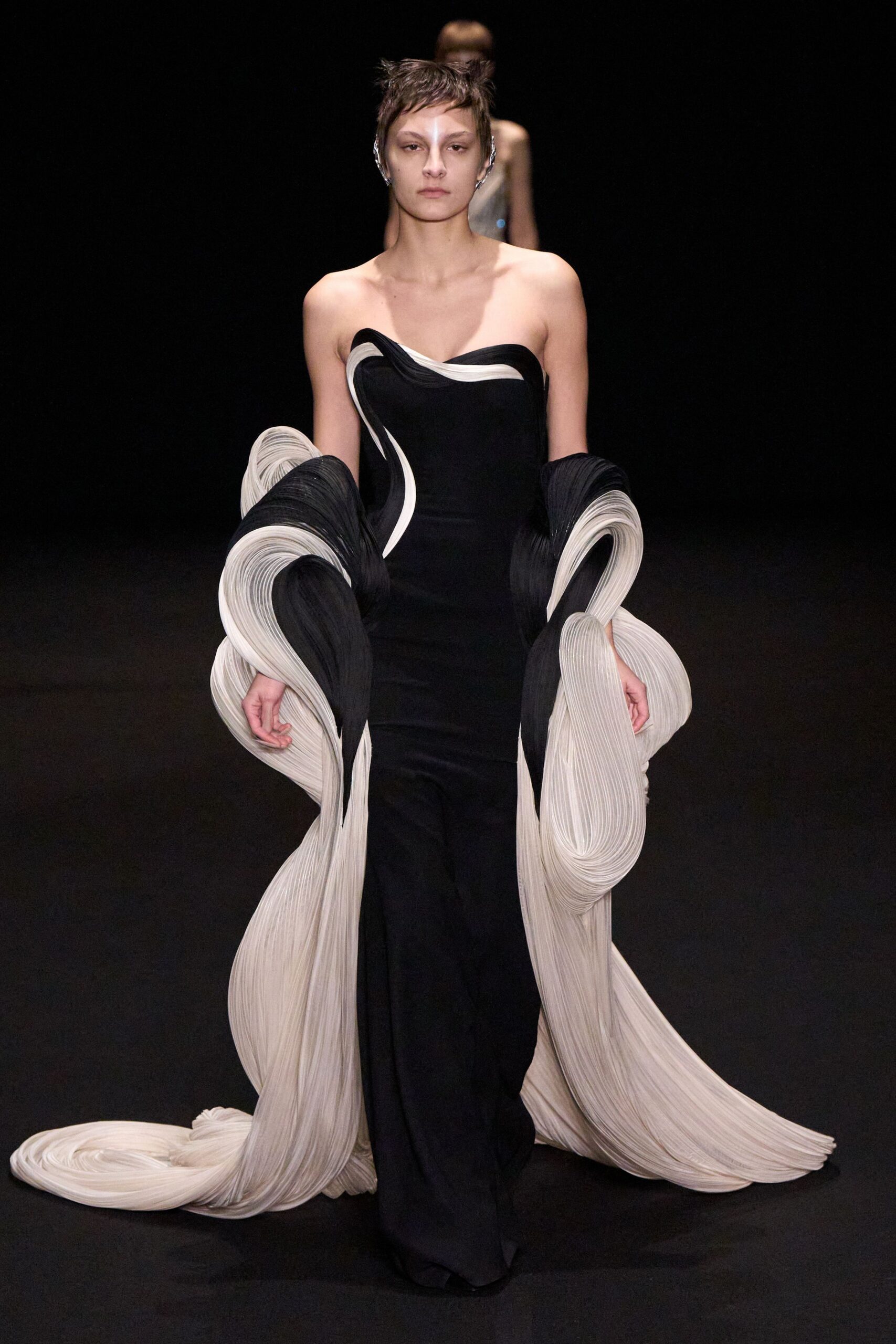 black and white draped gown