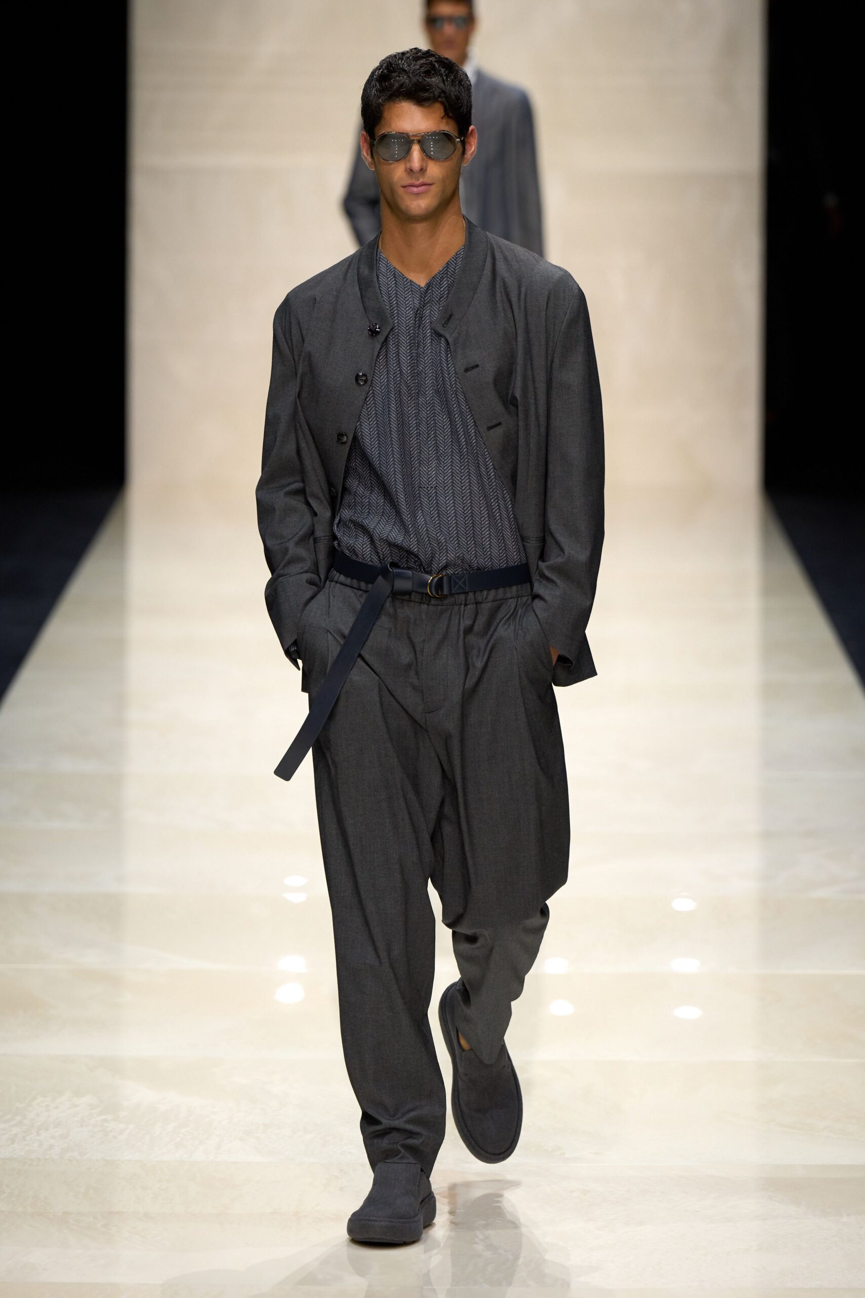 gray relaxed suit with sunglasses