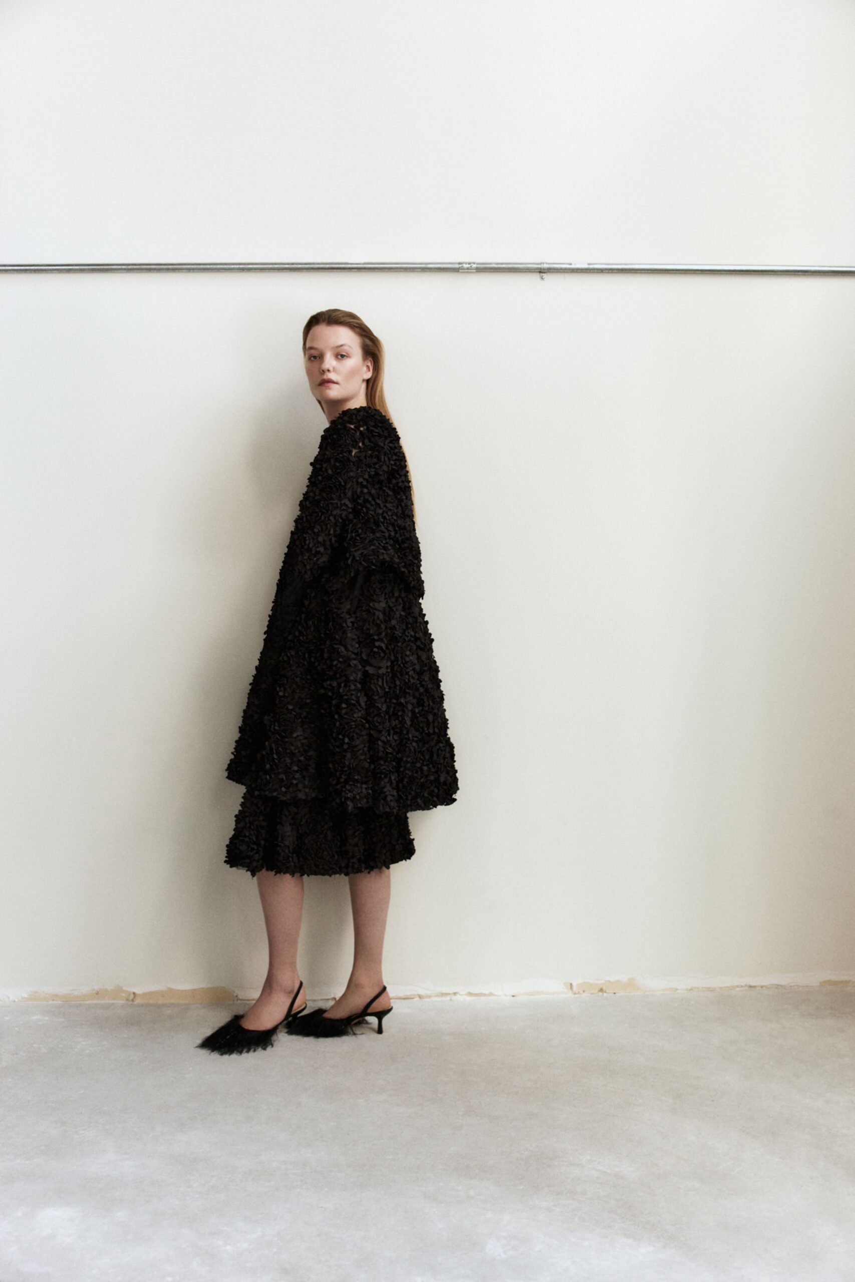 black ruffled midi dress and shoes