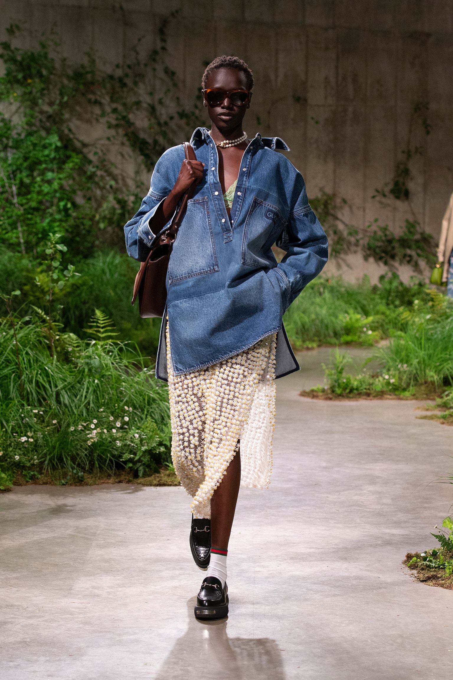 blue denim shirt with white pleated skirt