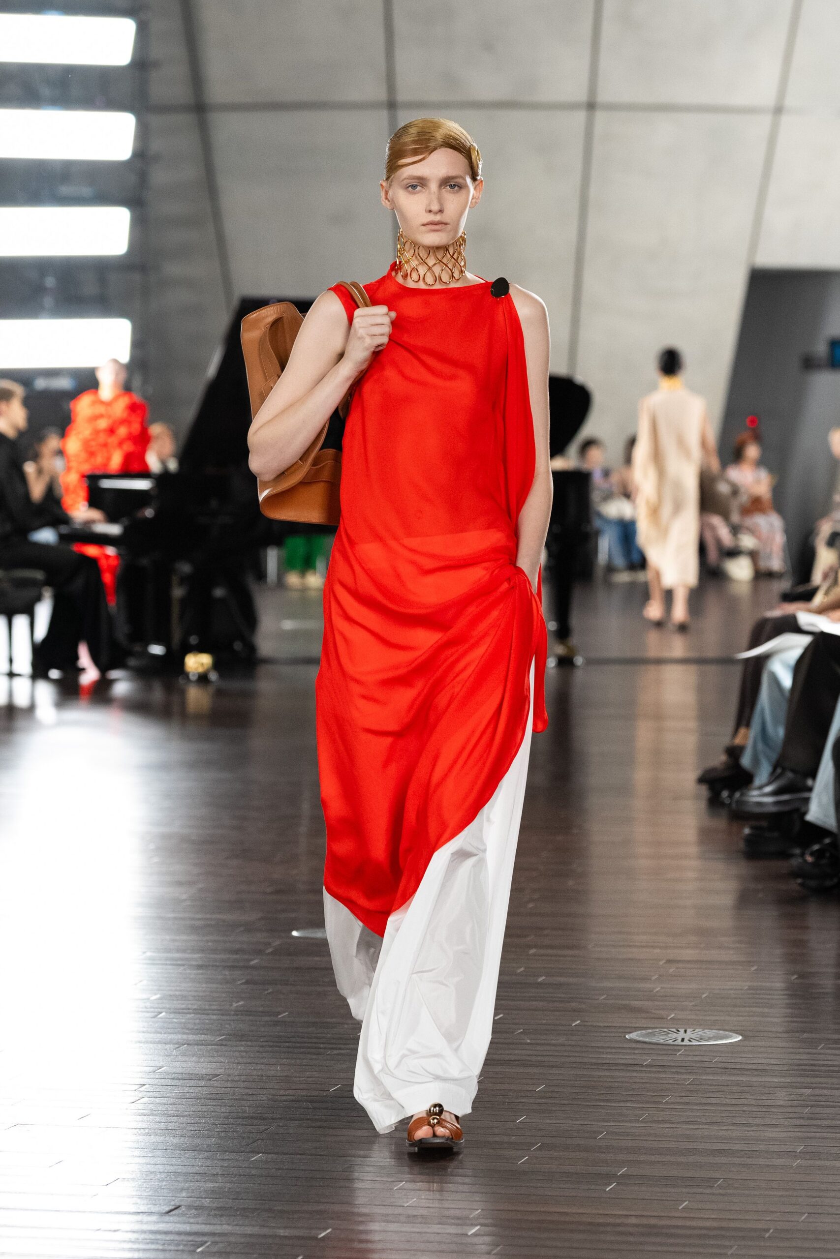 red and white asymmetric dress with bag