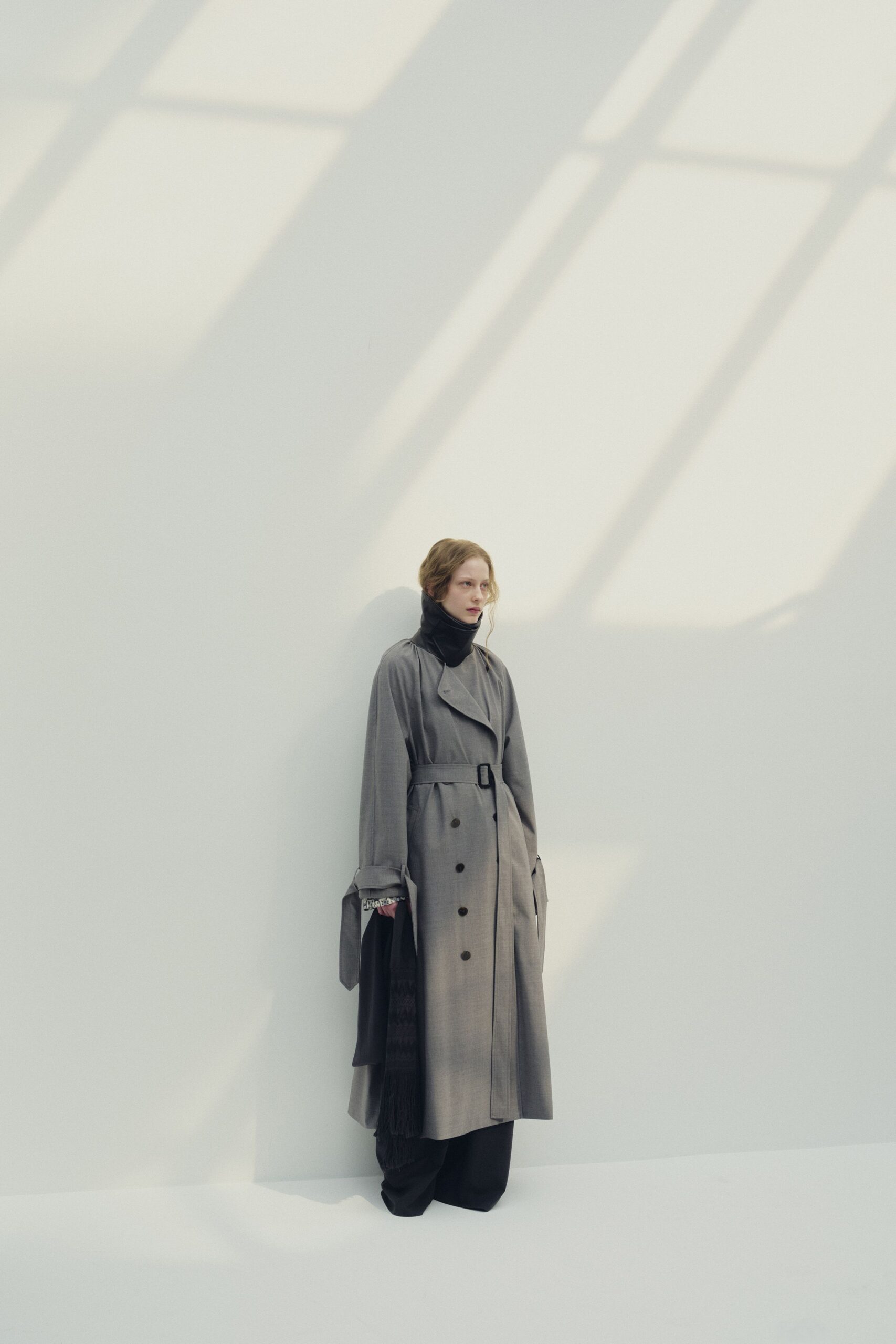 gray wool long-sleeve collared relaxed buttoned trench