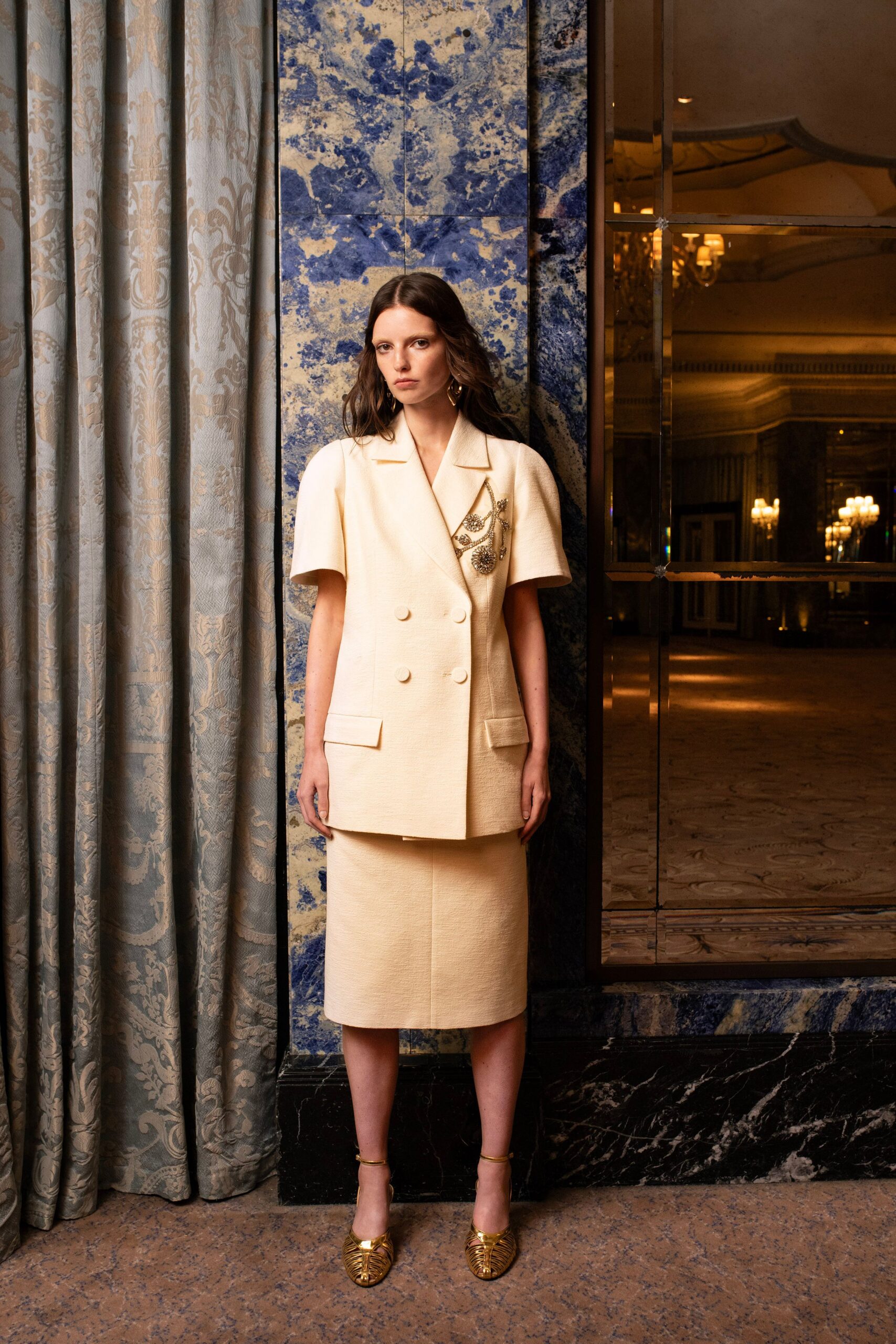 beige structured blazer and pencil skirt