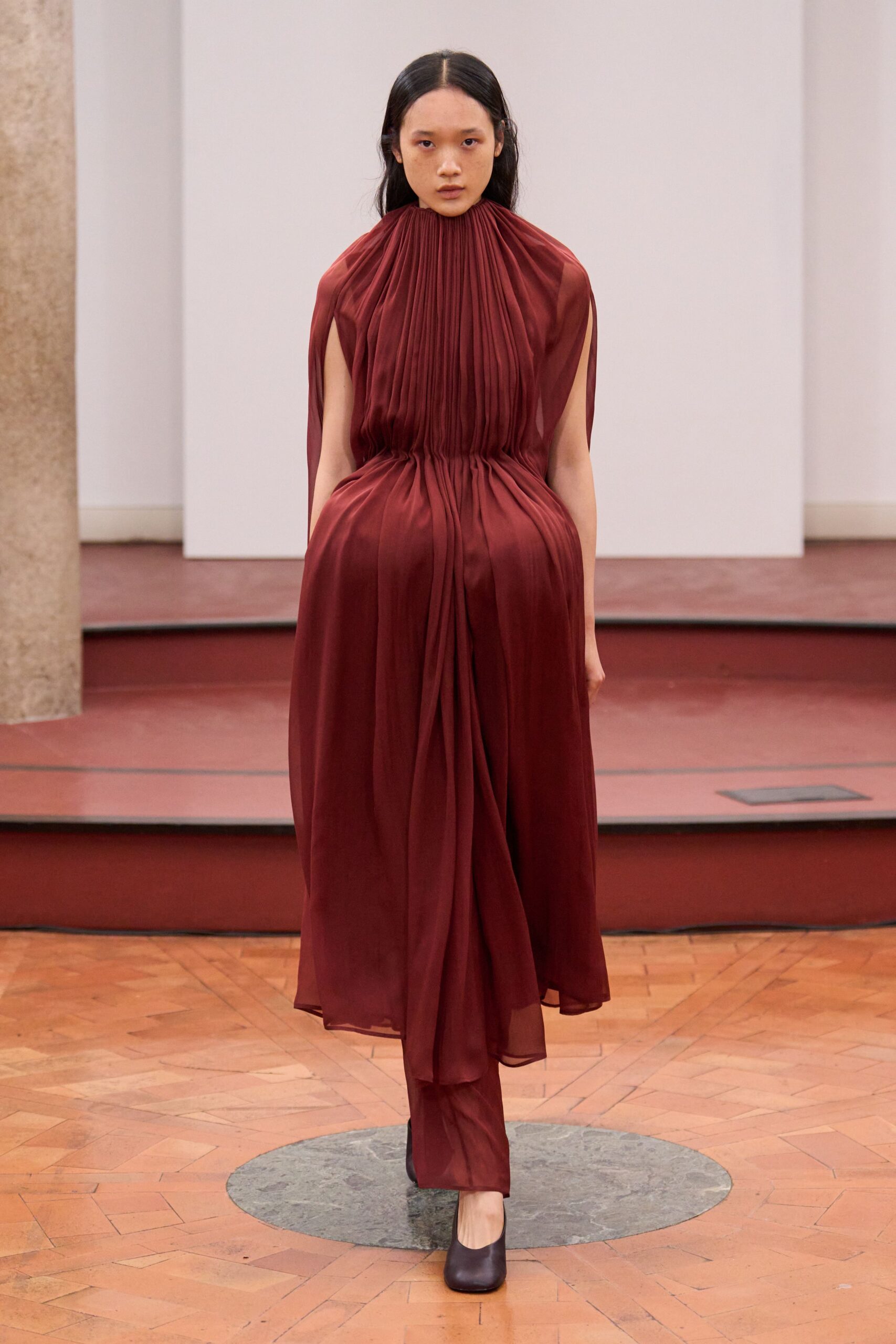 red silk pleated gown