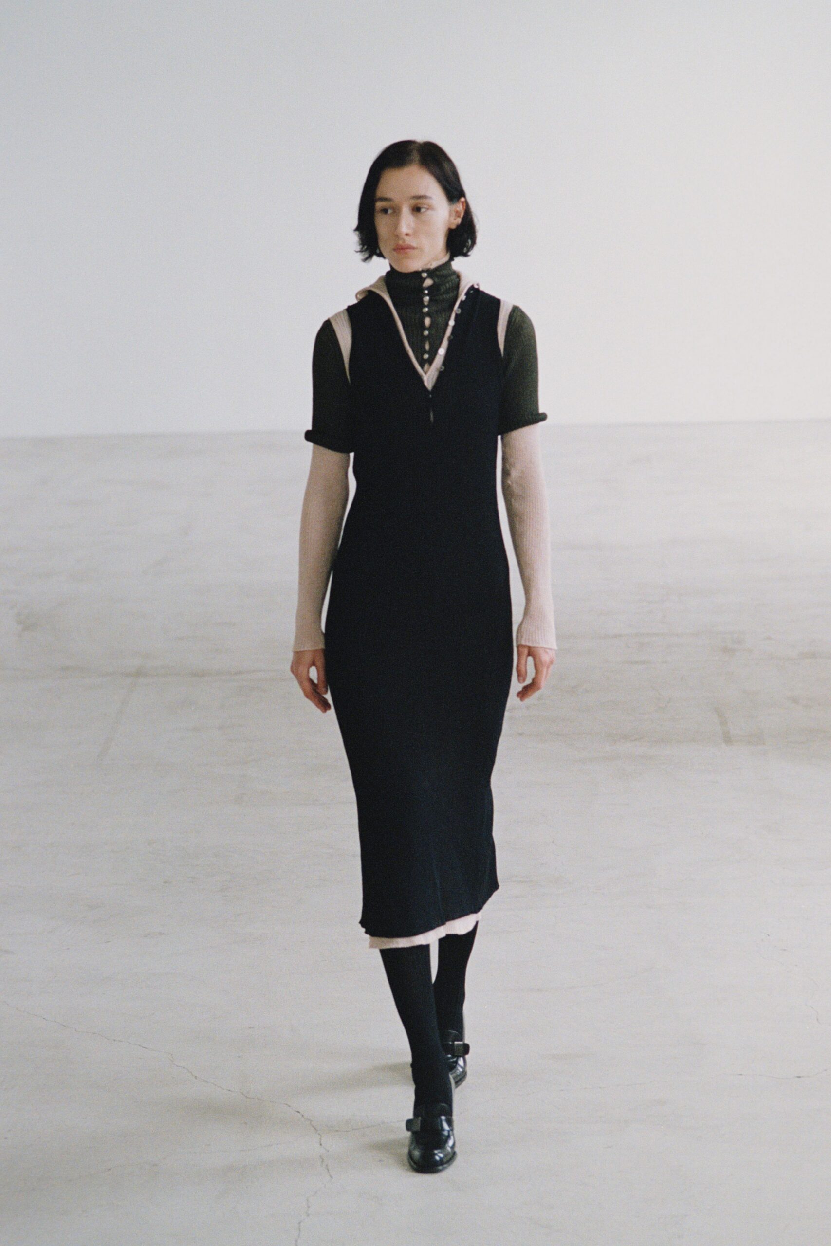black cotton short-sleeve high-neck fitted layered zippered dress