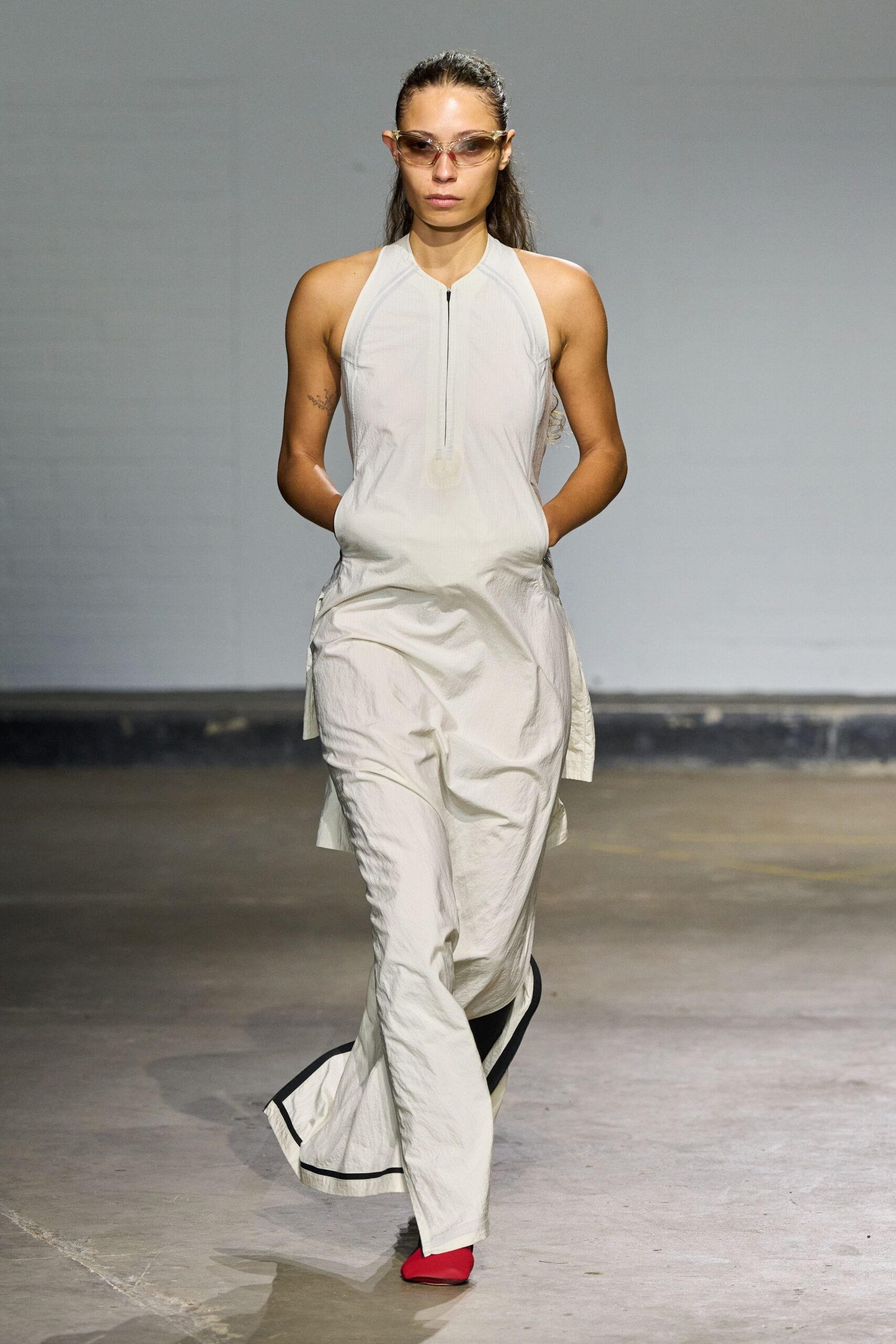 white fitted sleeveless jumpsuit