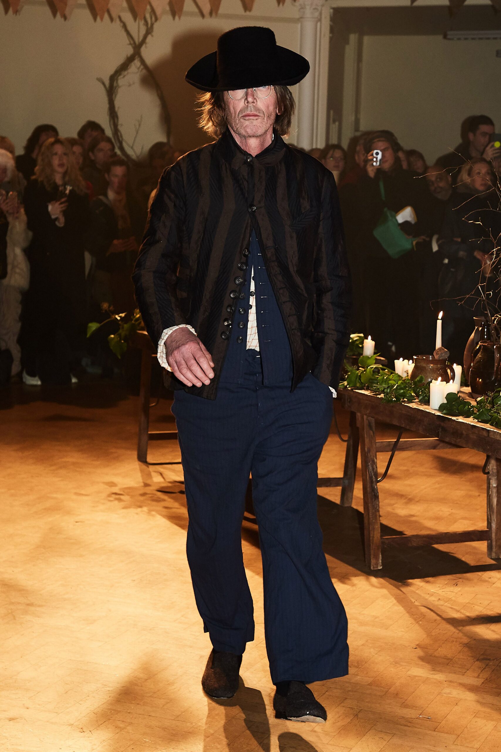 black relaxed jacket with blue pants