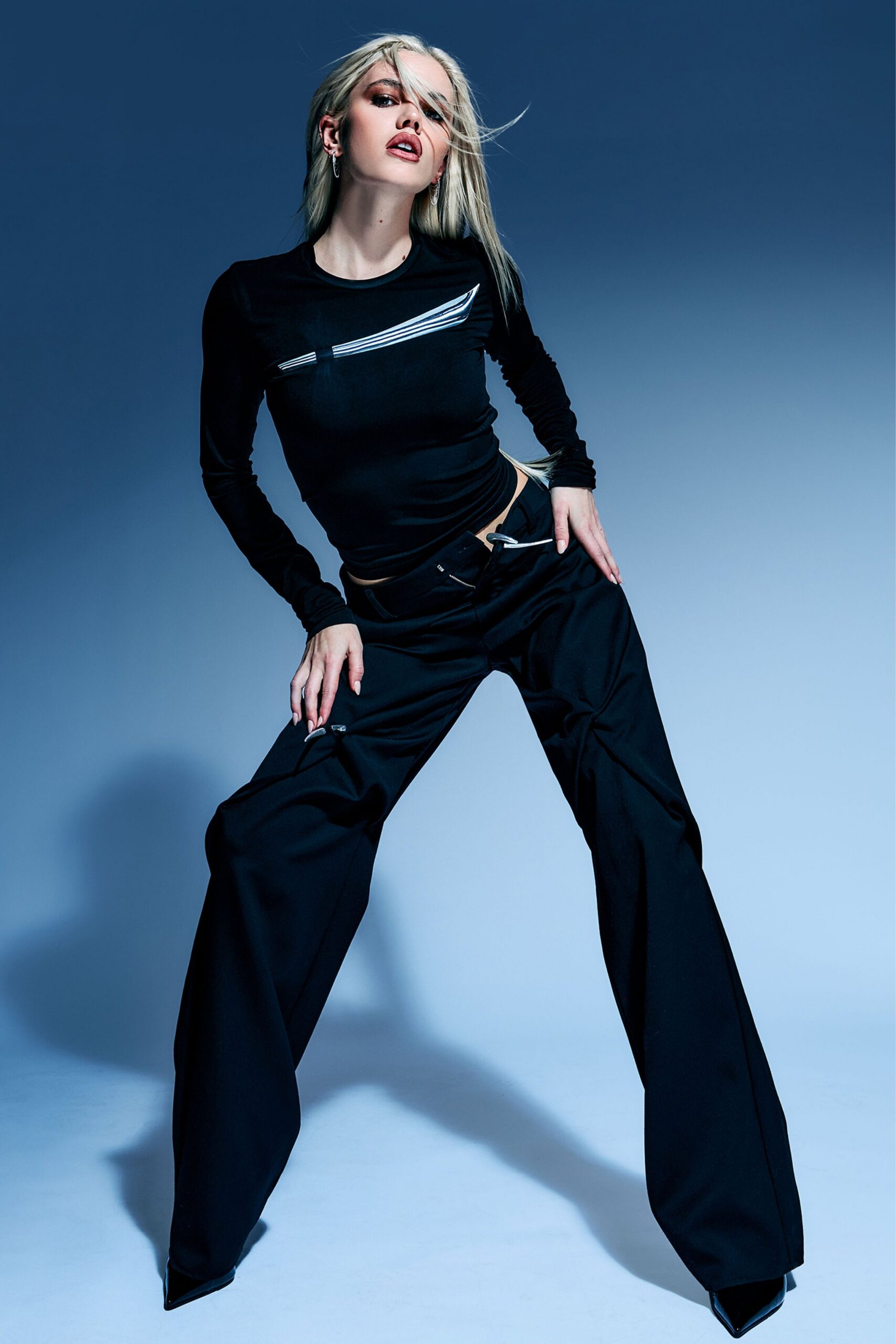 black fitted top and relaxed pants