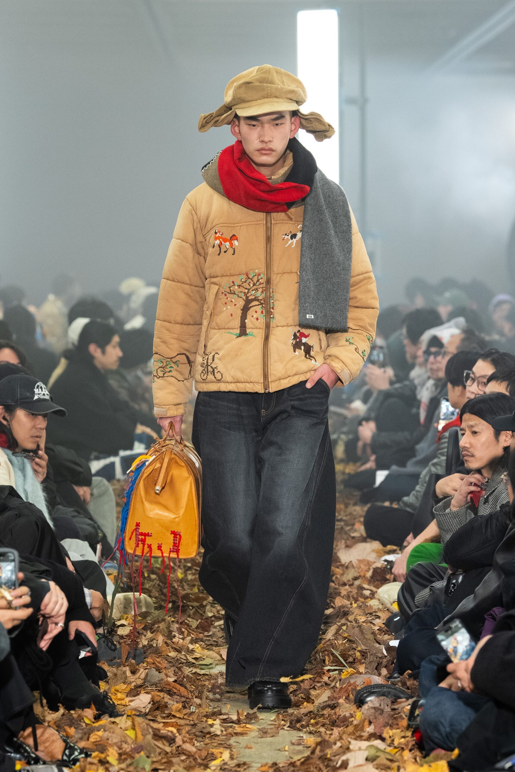 beige embroidered jacket with red scarf