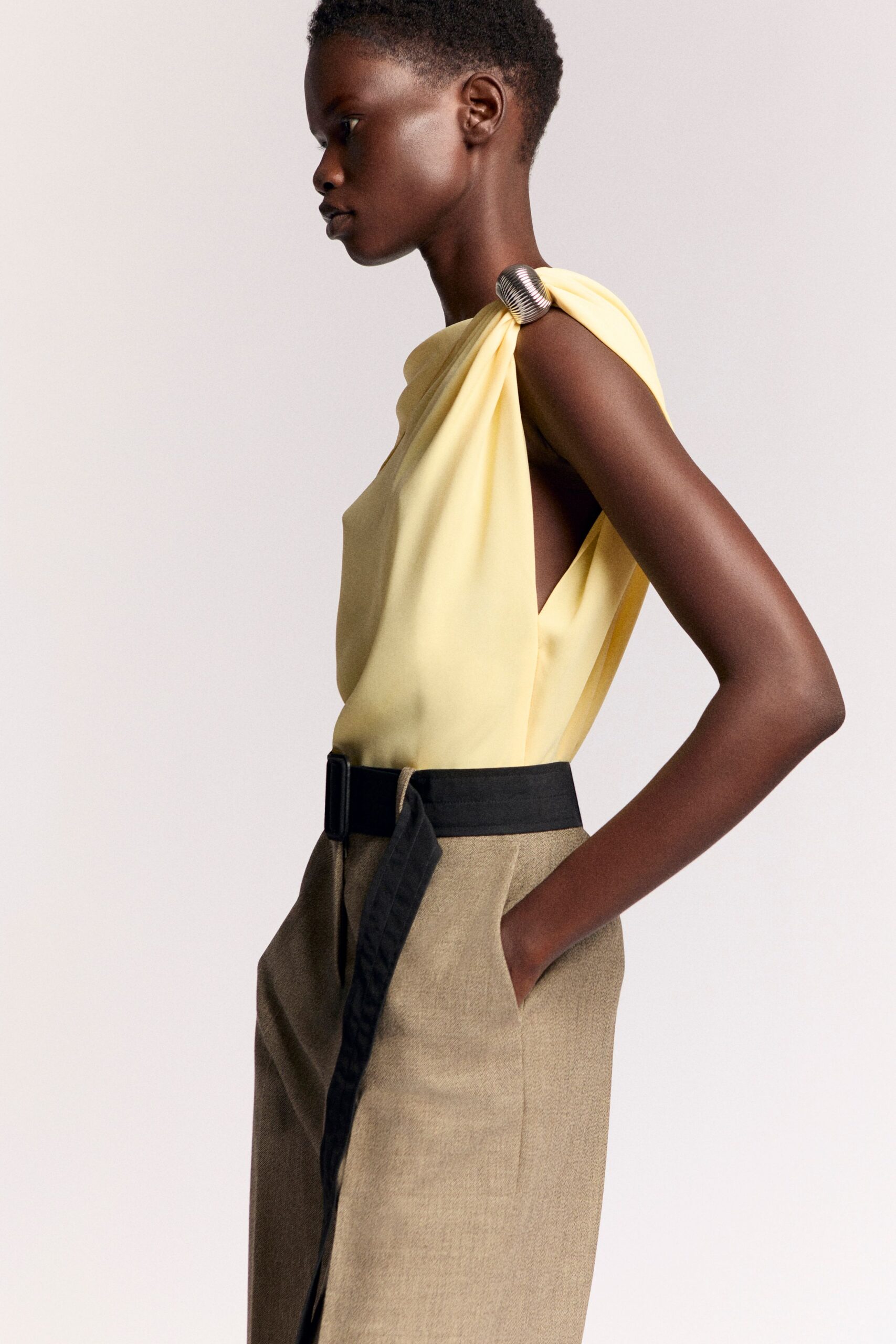 yellow silk sleeveless v-neck fitted draped top