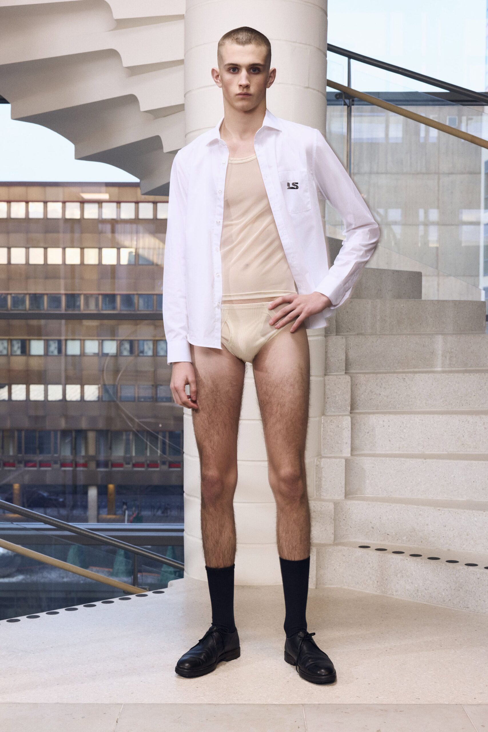 white shirt beige bodysuit black shoes