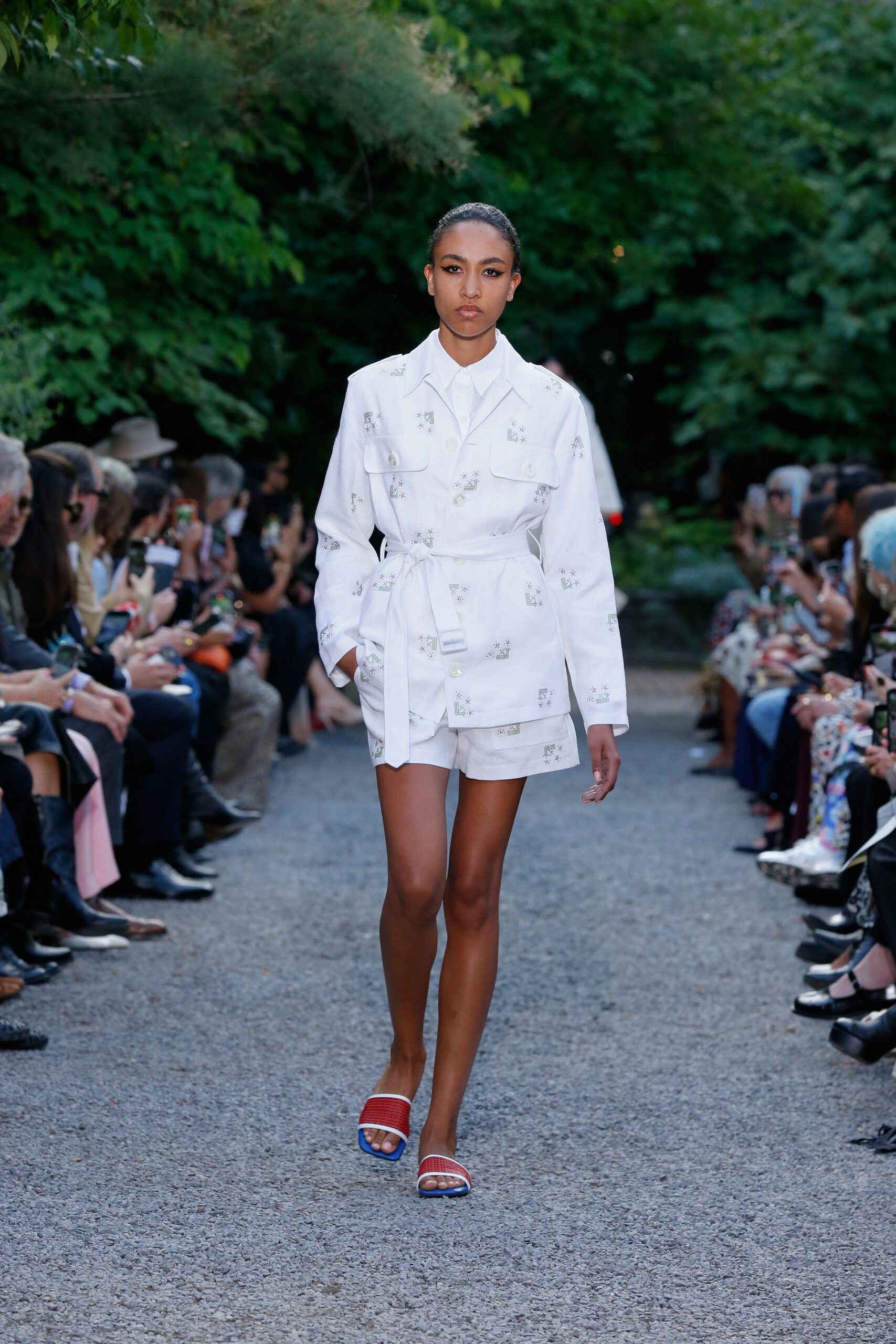 white cotton long-sleeve collared fitted buttoned printed dress