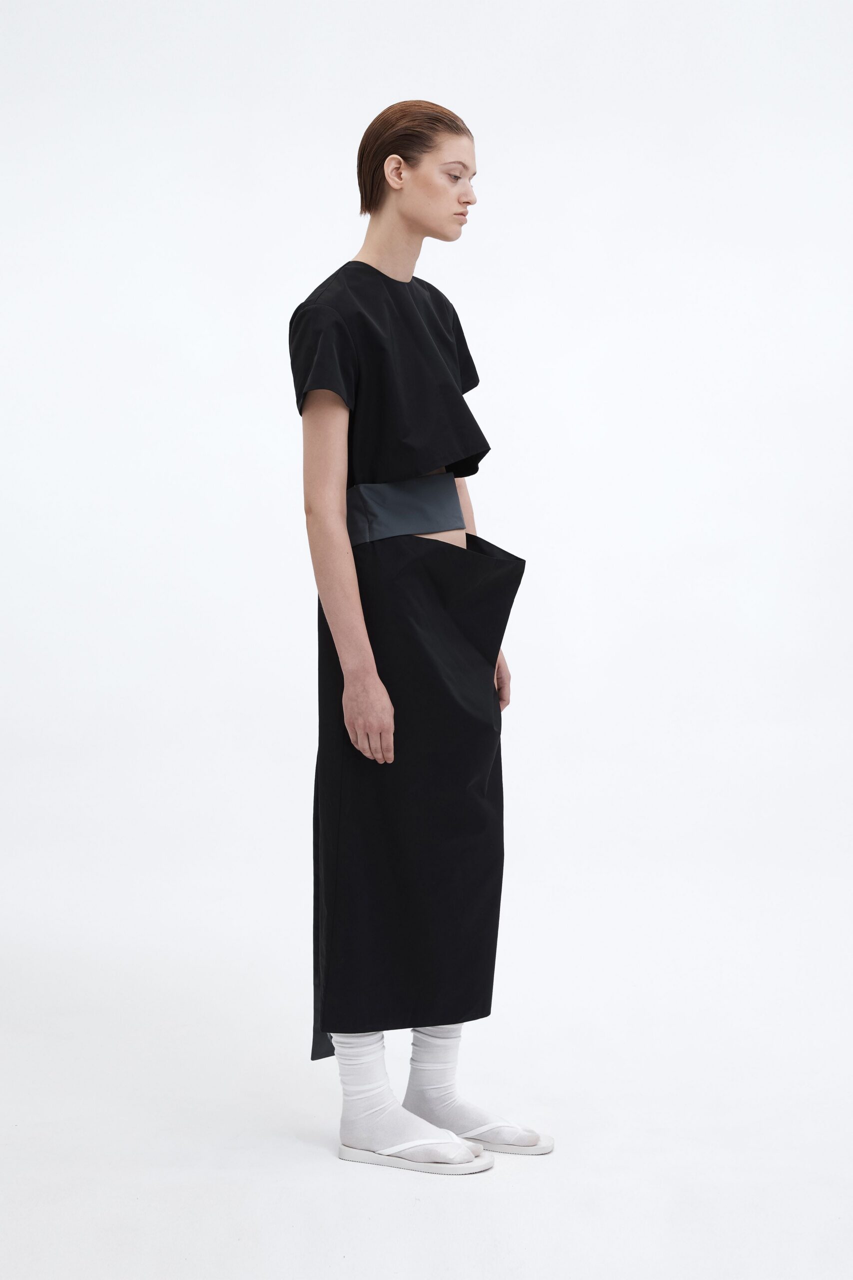 black relaxed midi dress with white shoes