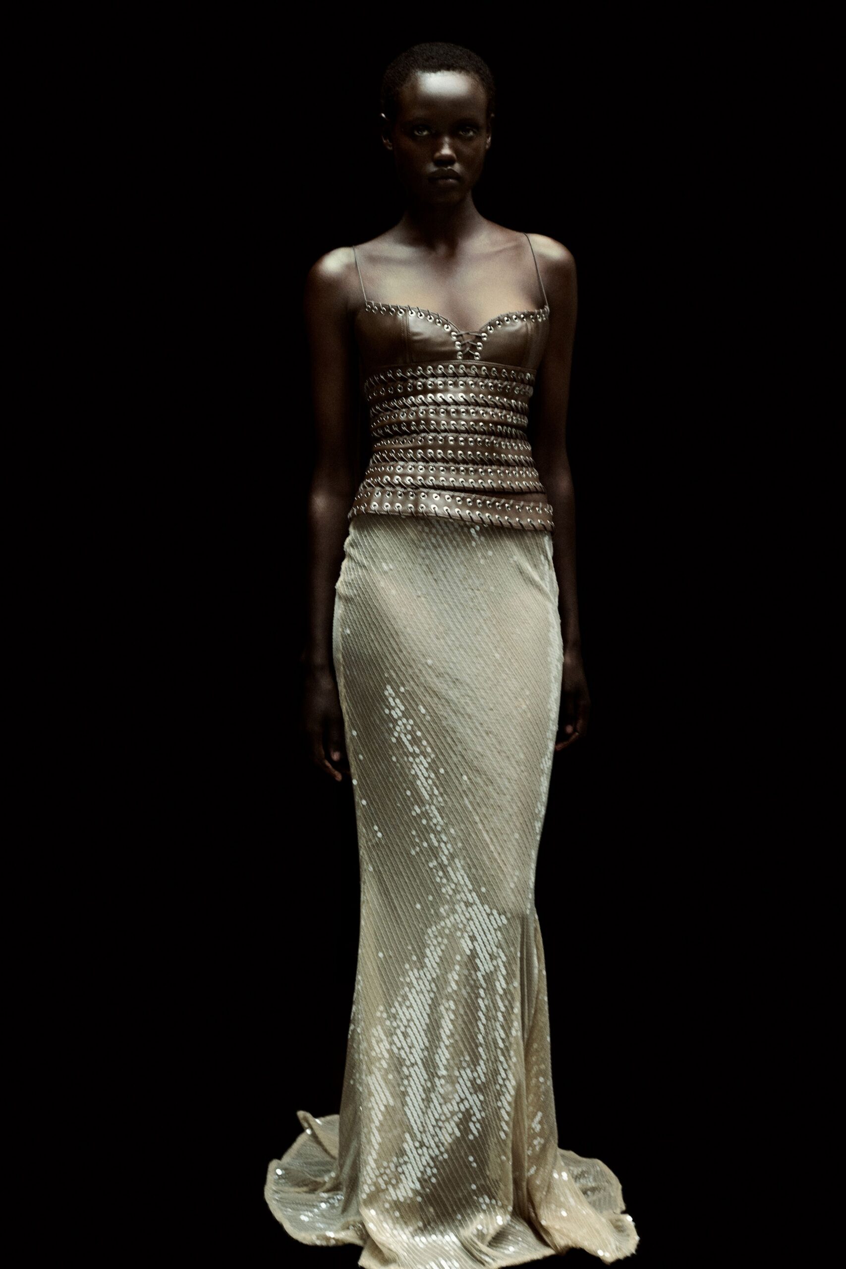 gold sequin sleeveless gown
