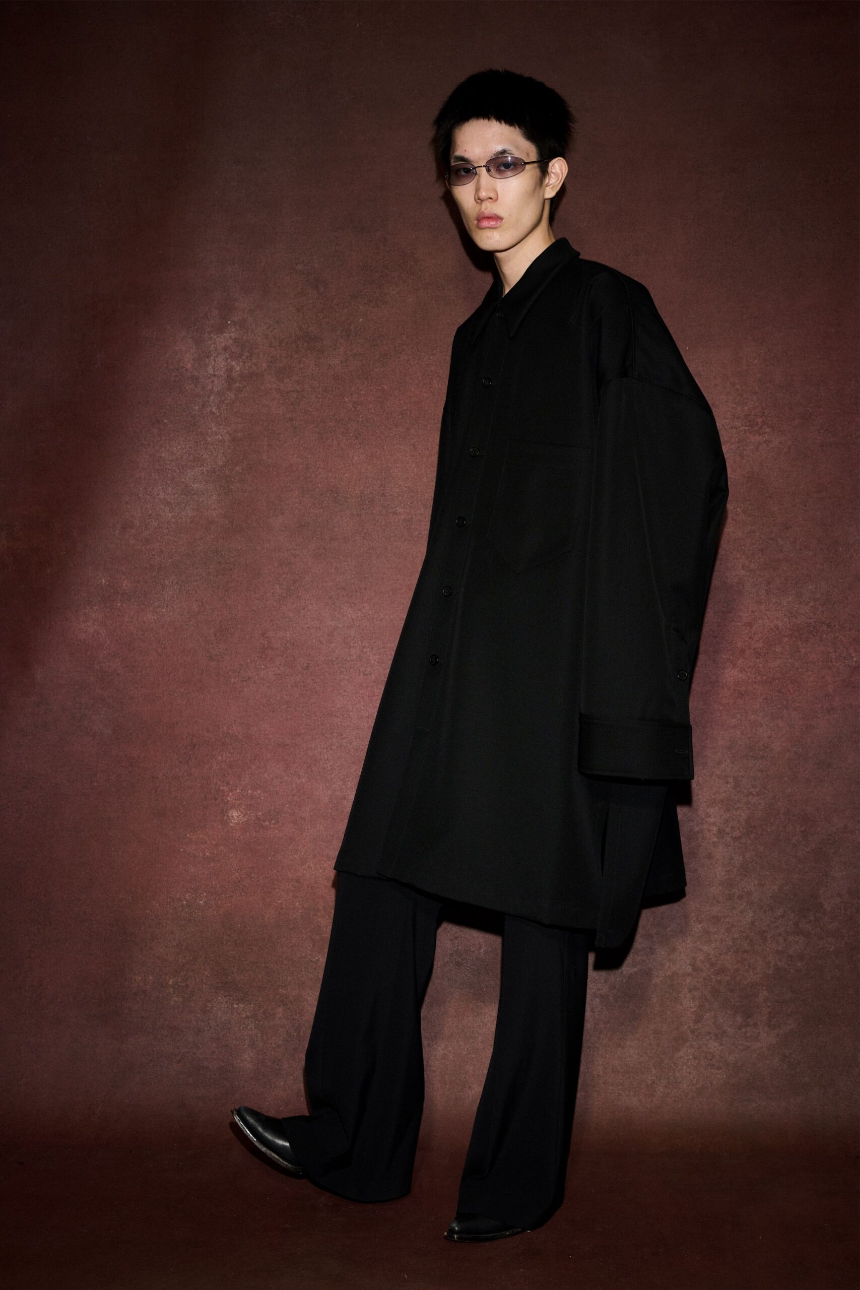 black oversized coat with relaxed pants