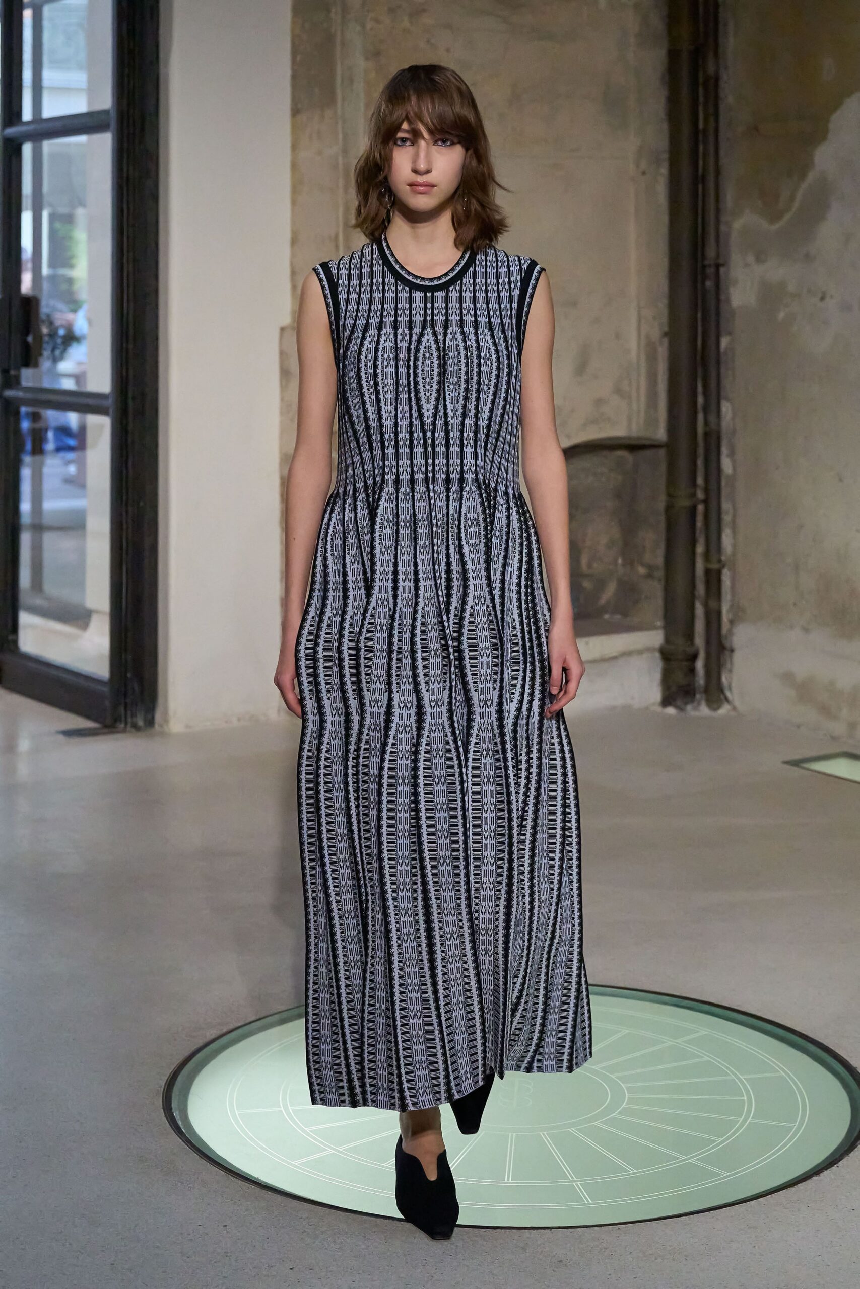 black cotton sleeveless high-neck fitted printed tiered dress