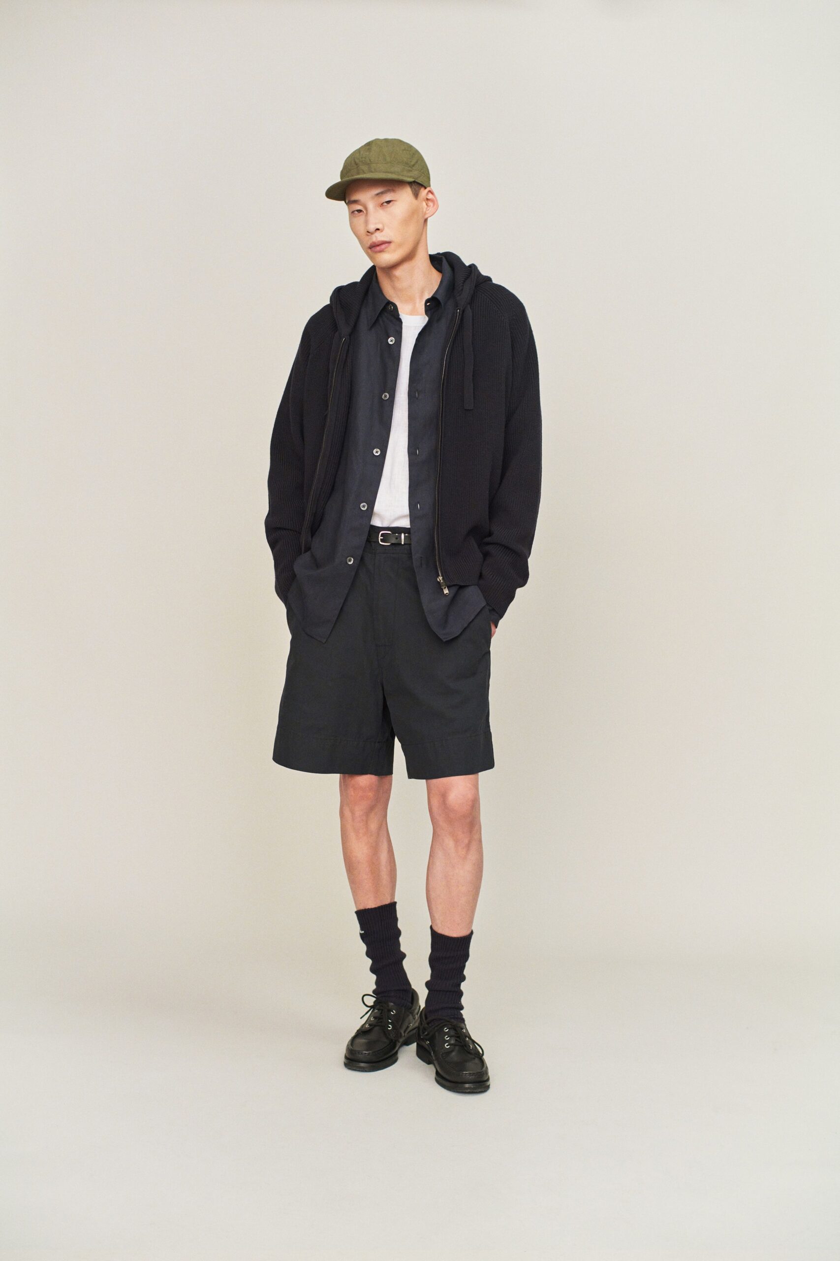 black hoodie white shirt navy shorts
