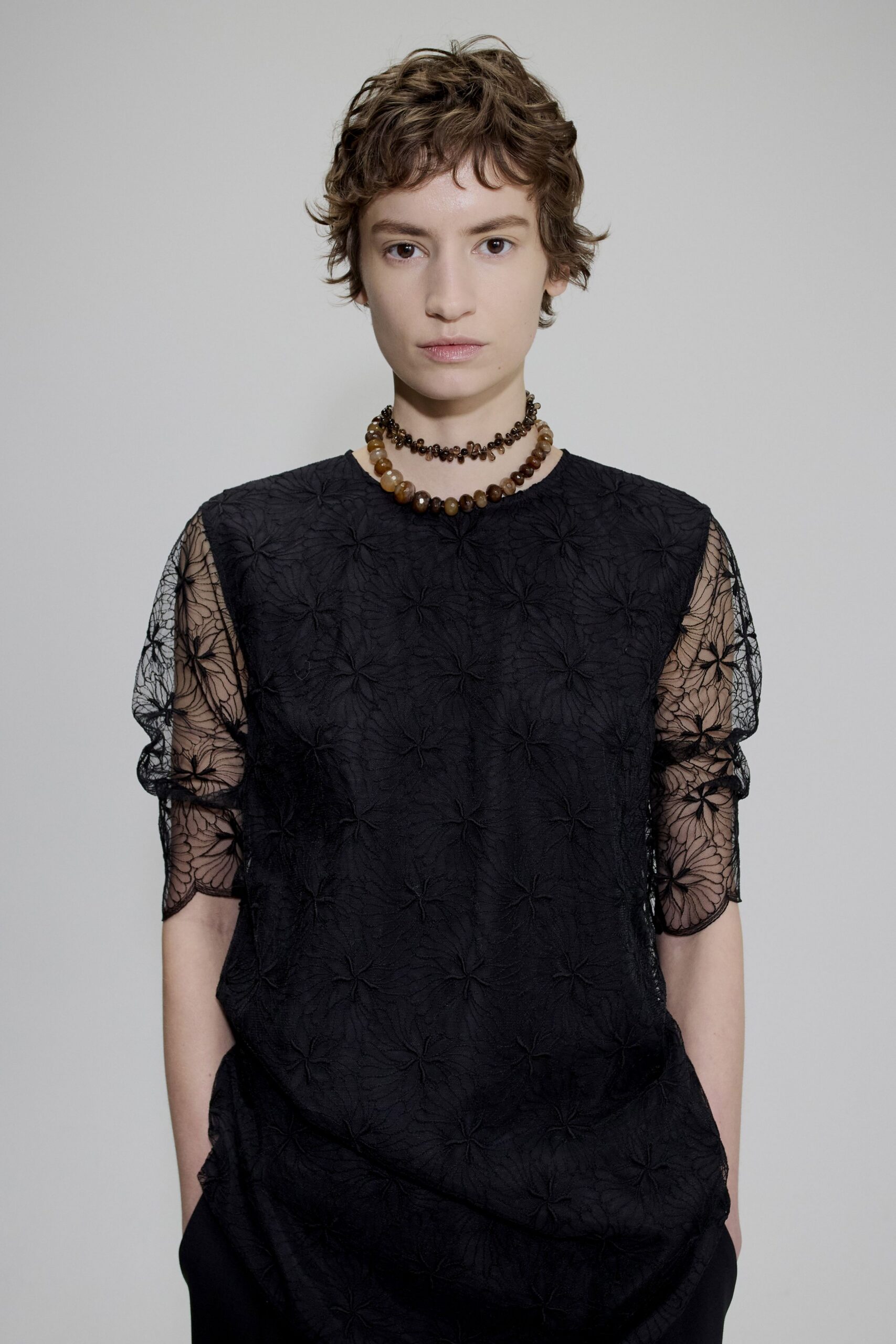 black embroidered long-sleeve top