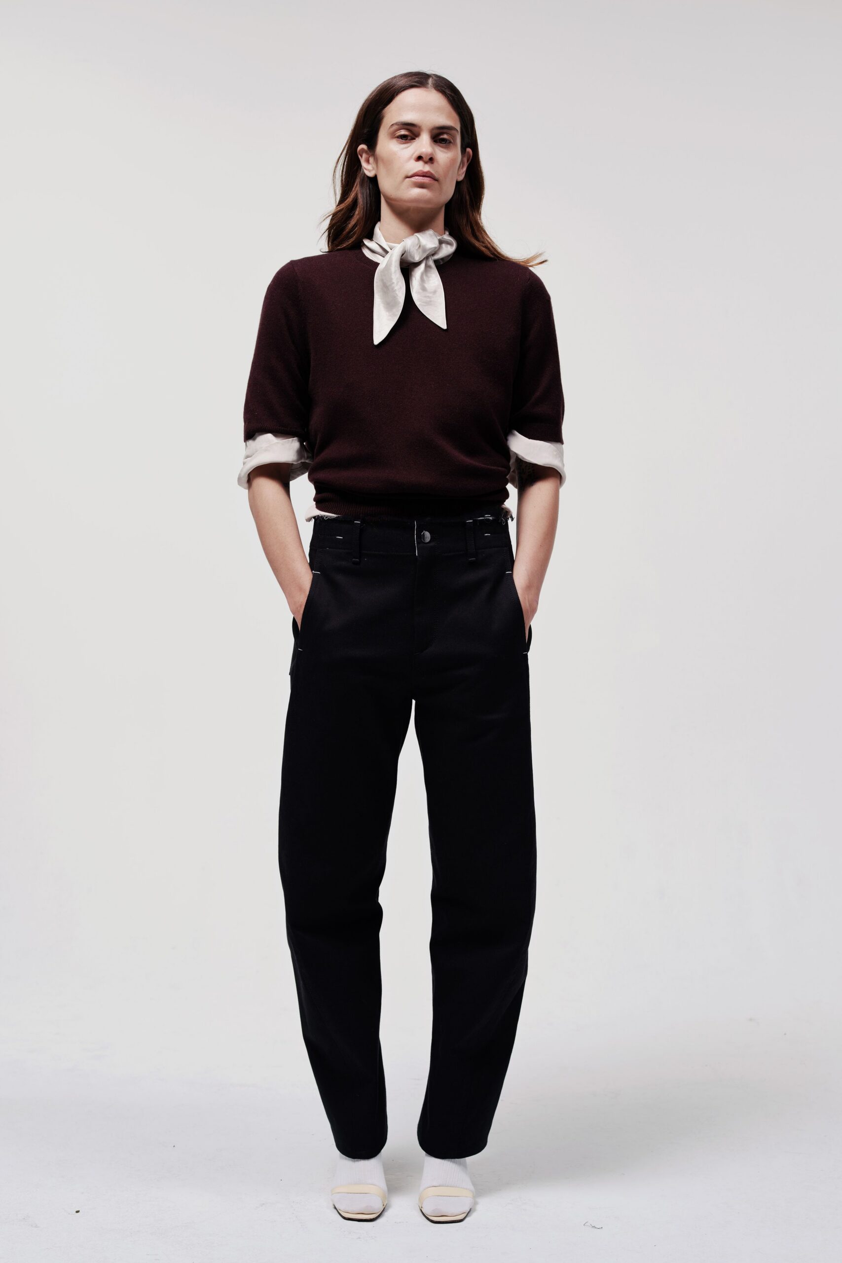 brown wool fitted sweater with black pants