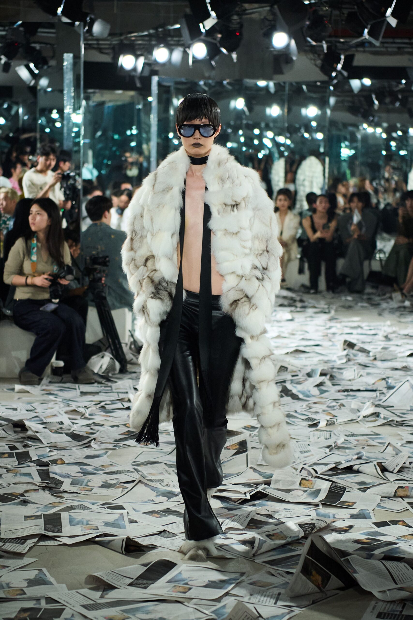 white fur coat with black leather pants