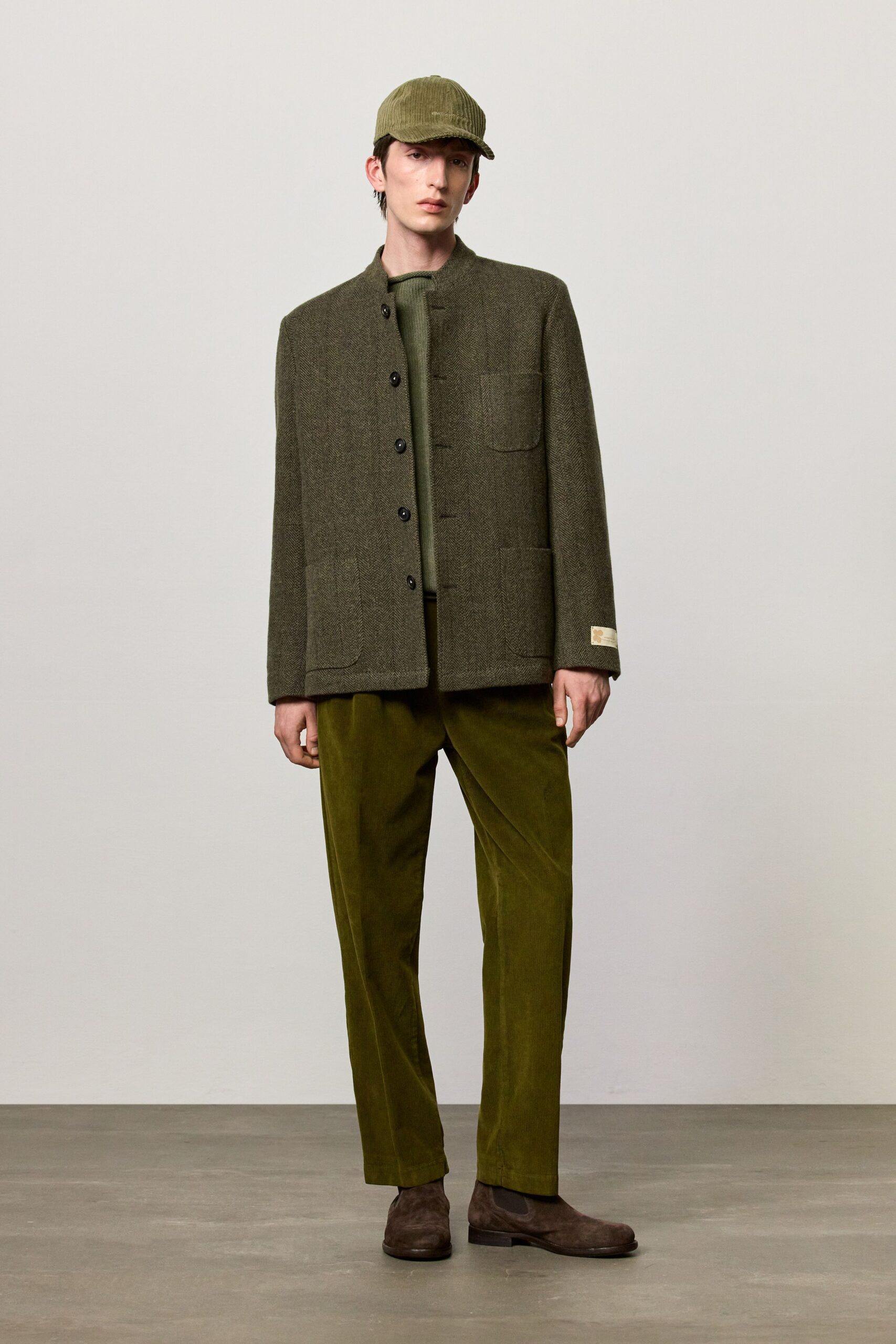 green wool long-sleeve collared structured buttoned pockets jacket
