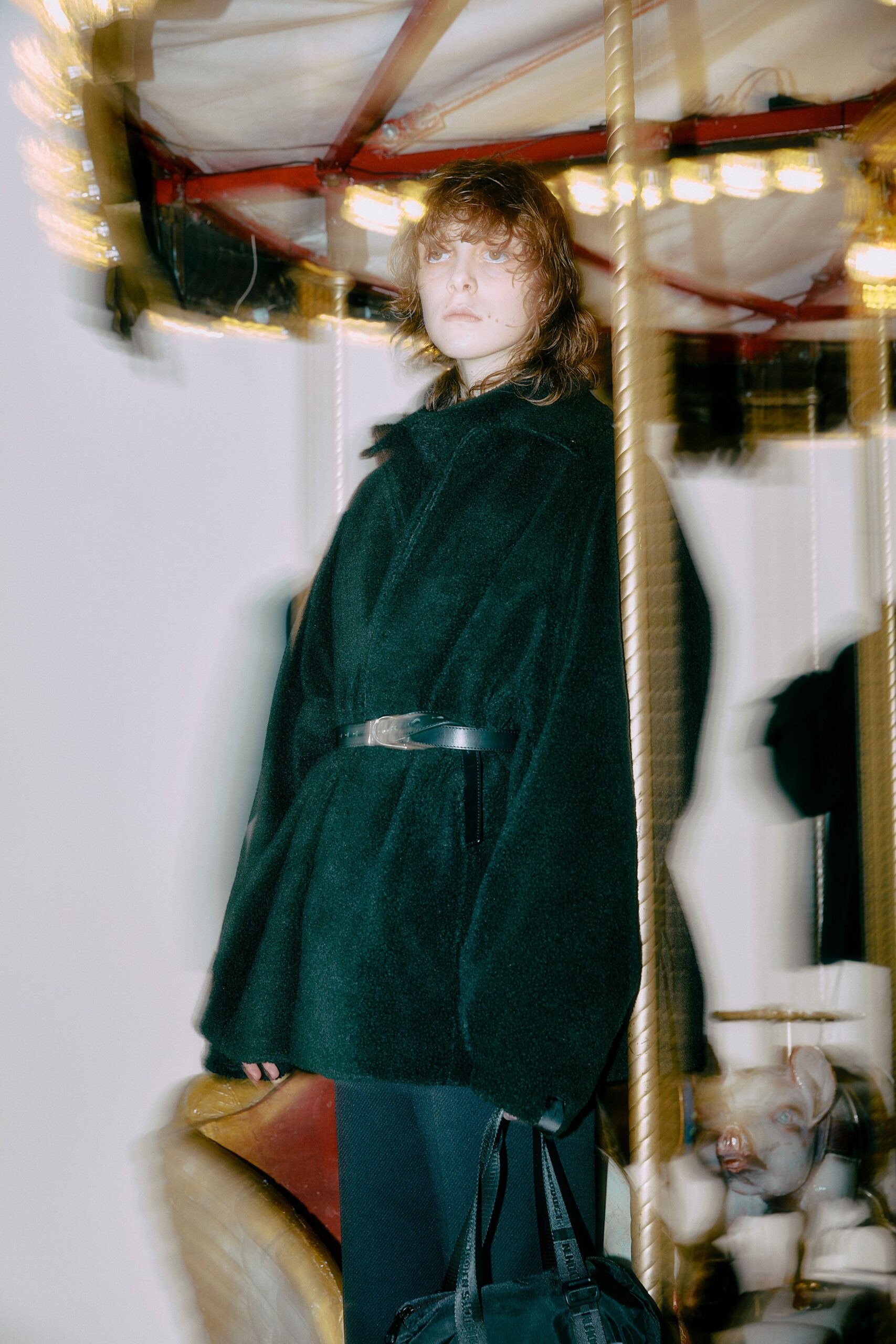 black faux-fur coat with belt
