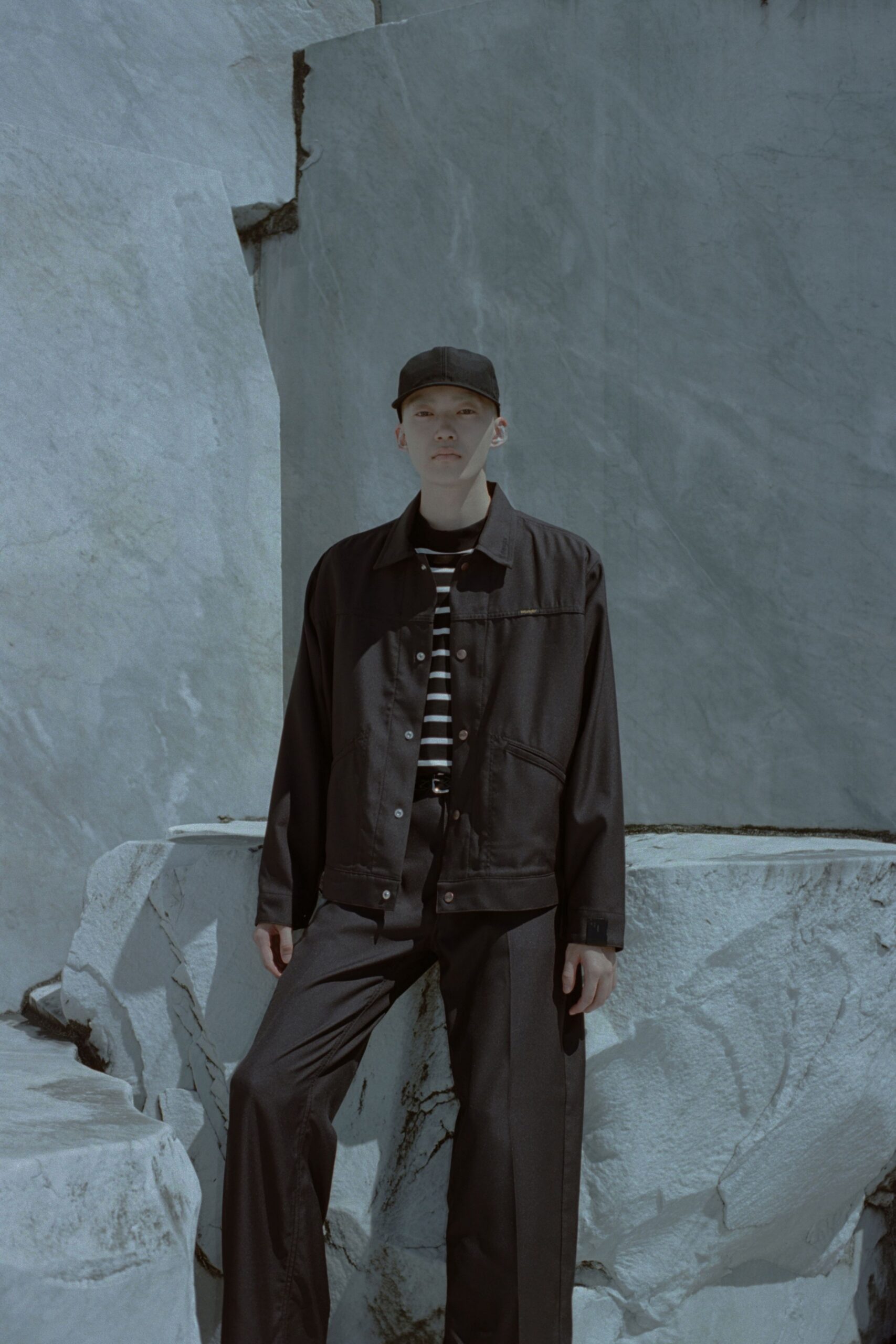 black relaxed jacket with striped shirt