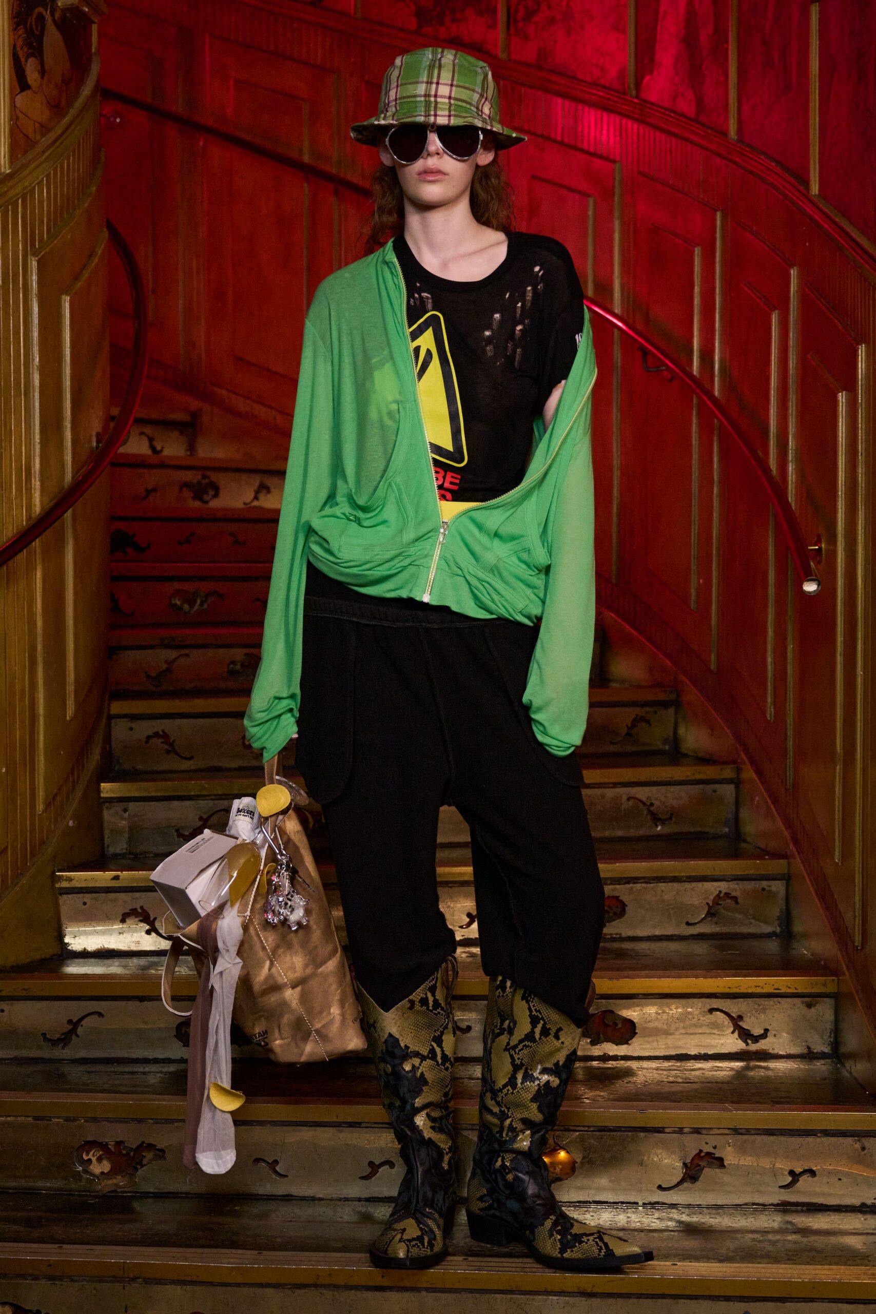 green hoodie black t-shirt pants boots