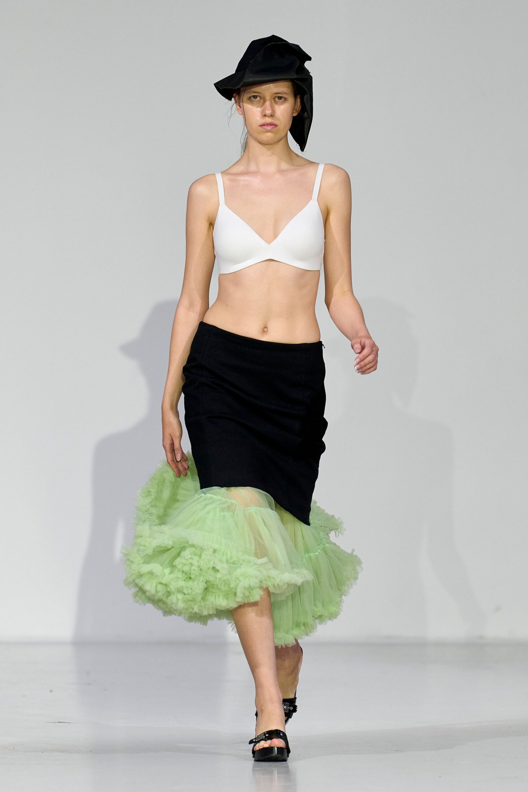 white fitted top black skirt