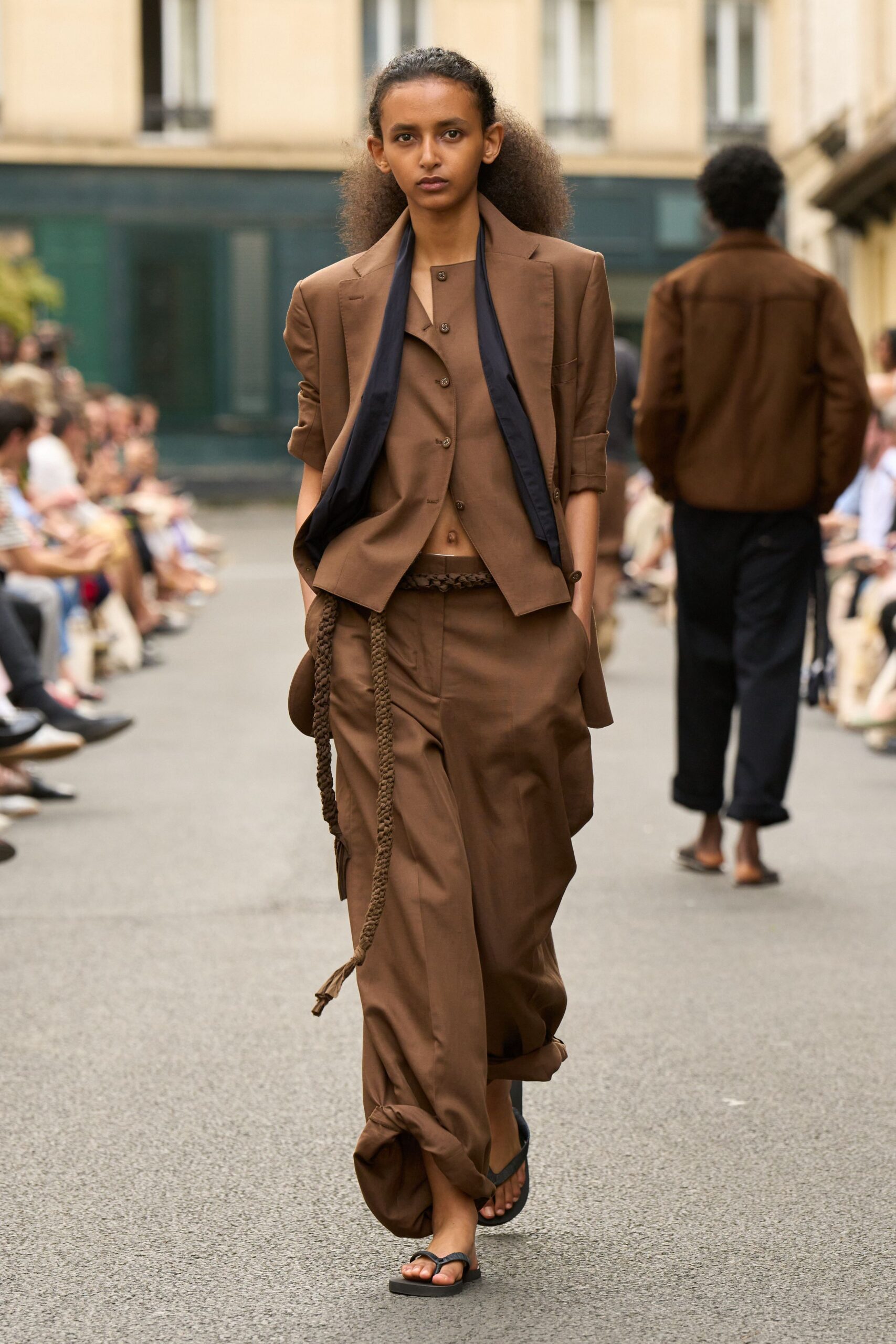 brown blazer and relaxed pants