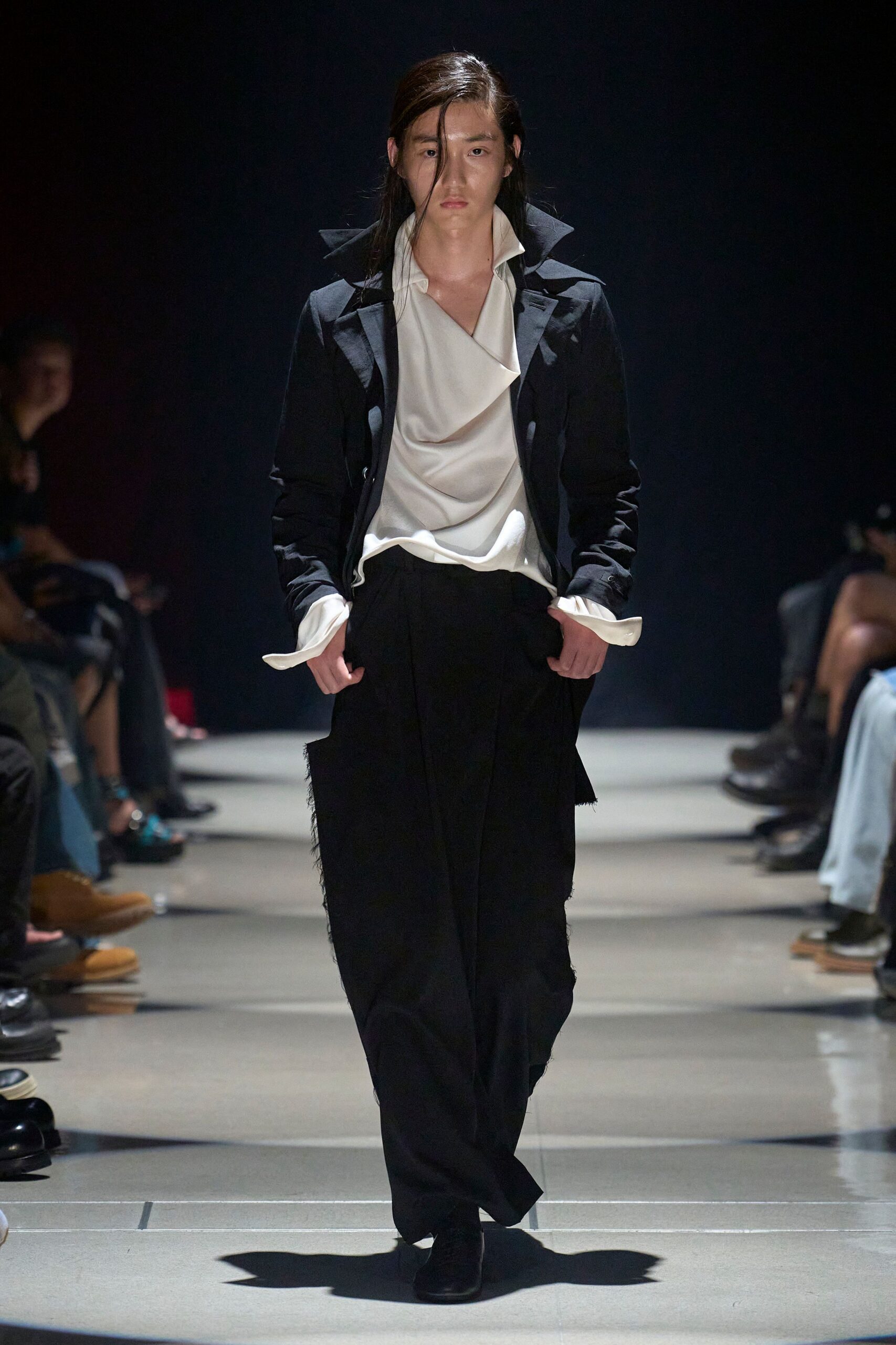 black cotton long-sleeve collared structured buttoned coat