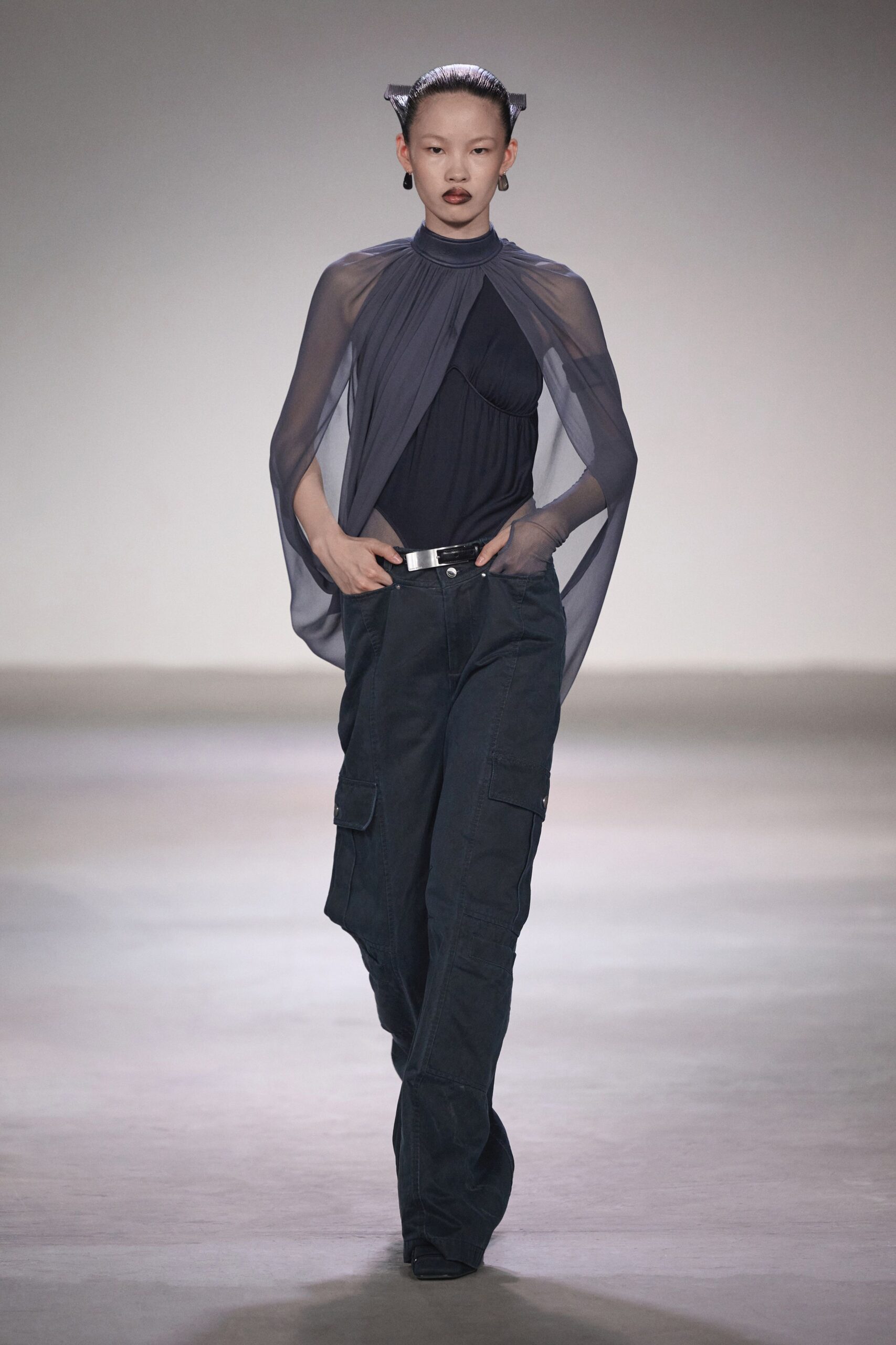 black fitted top with gray cape