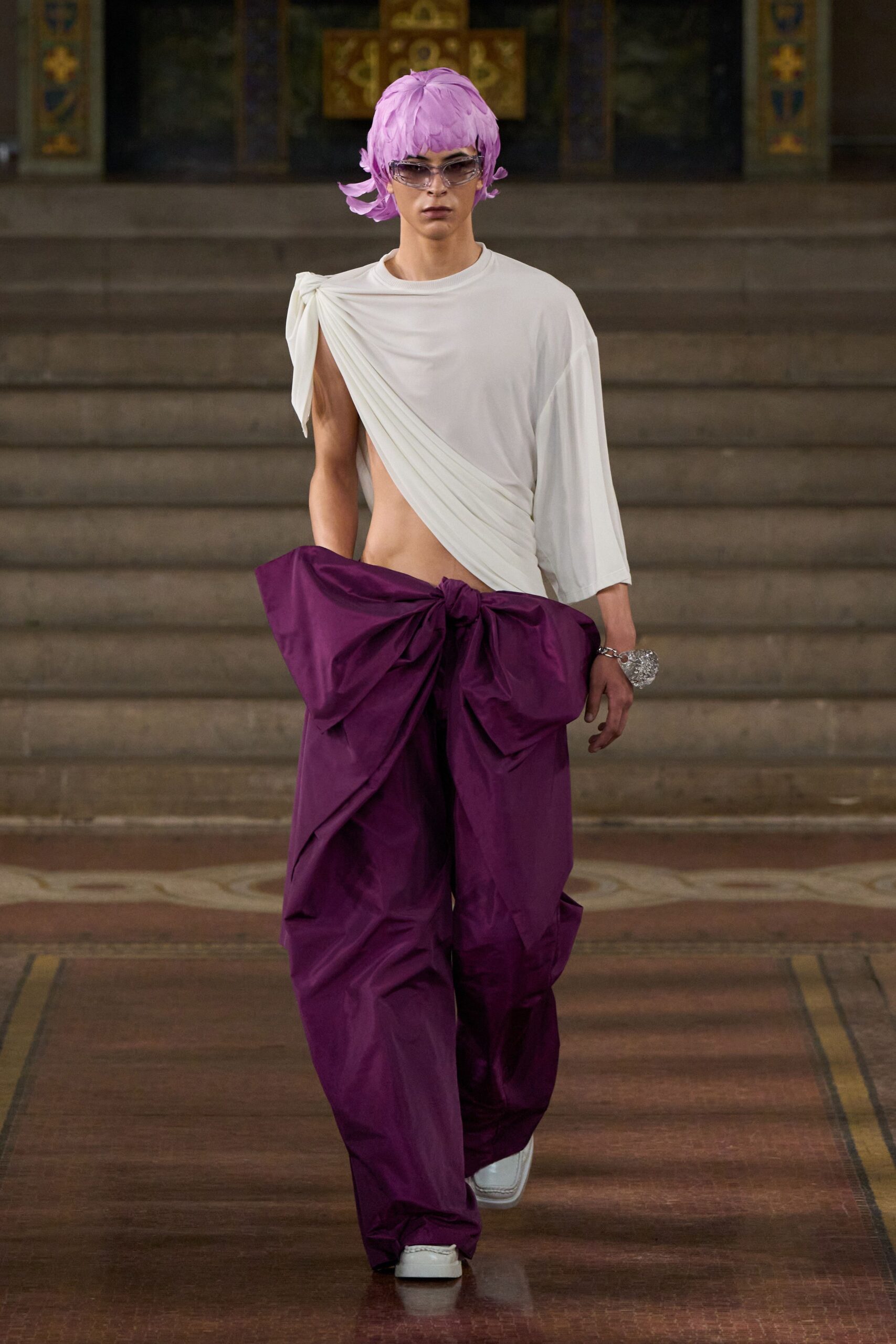 white relaxed top with purple pants