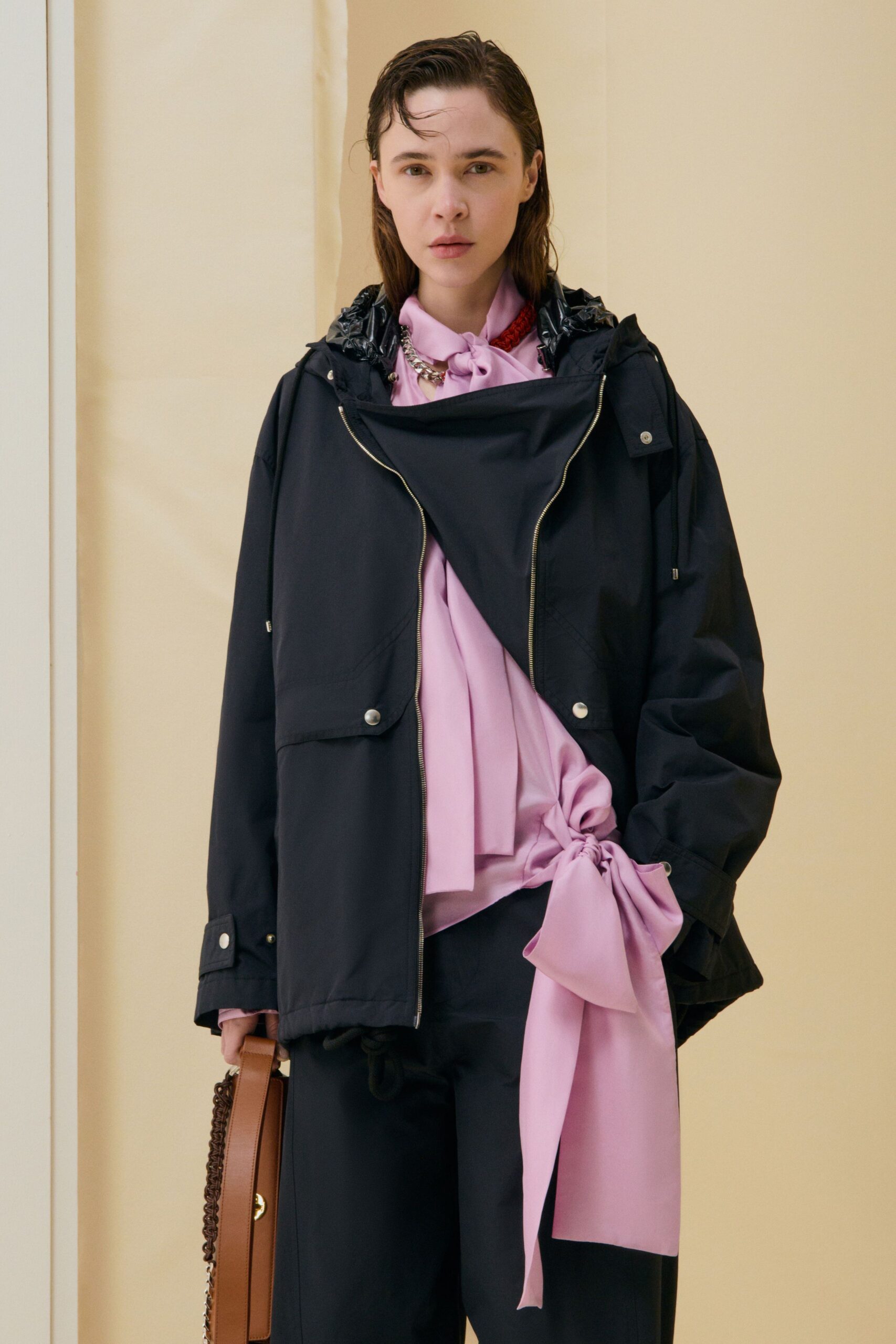 black jacket pink shirt relaxed pants
